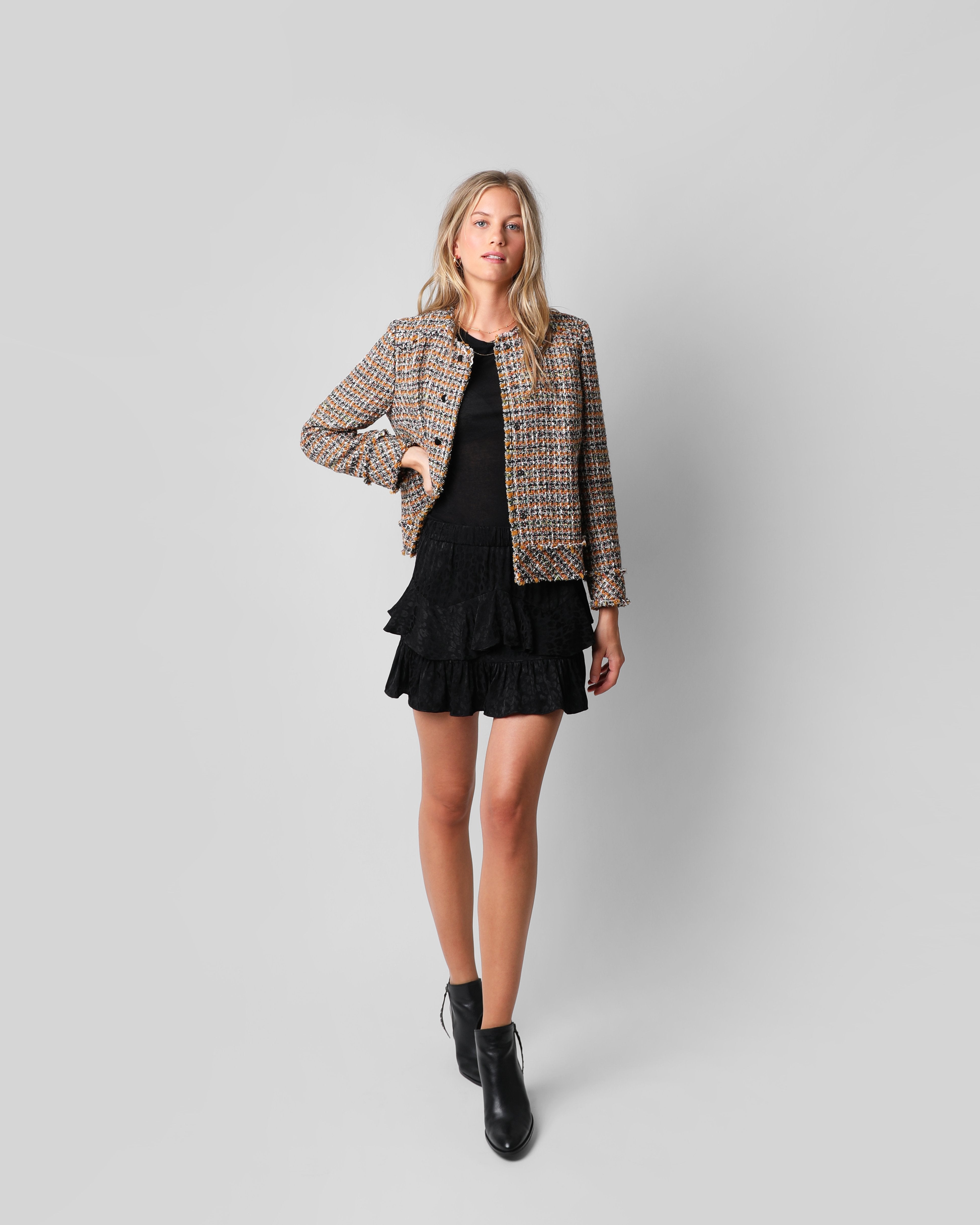 FALDA MINI VOLANTE JACQUARD NEGRA