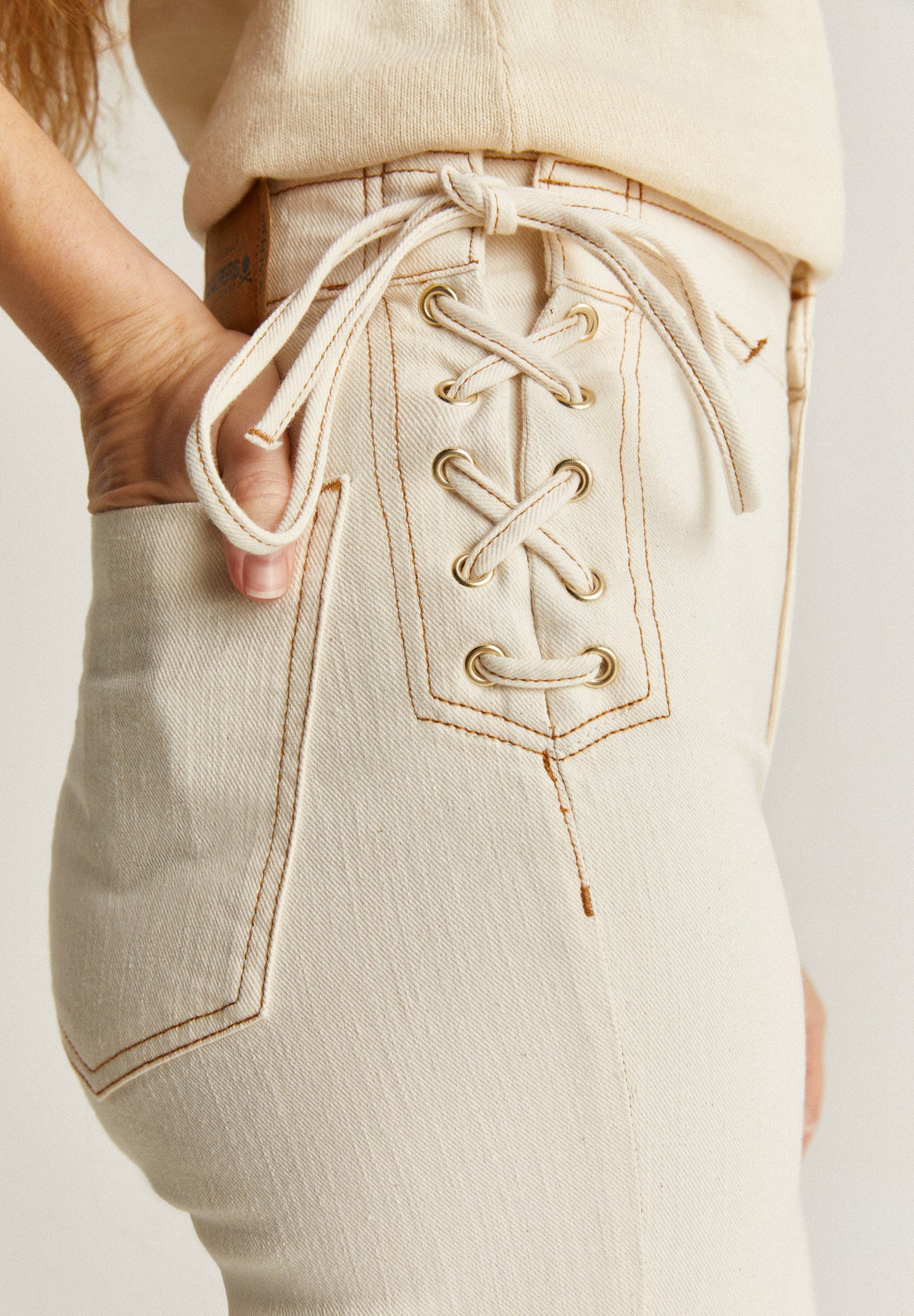 BOOTCUT JEANS WITH DRAWSTRING DETAIL