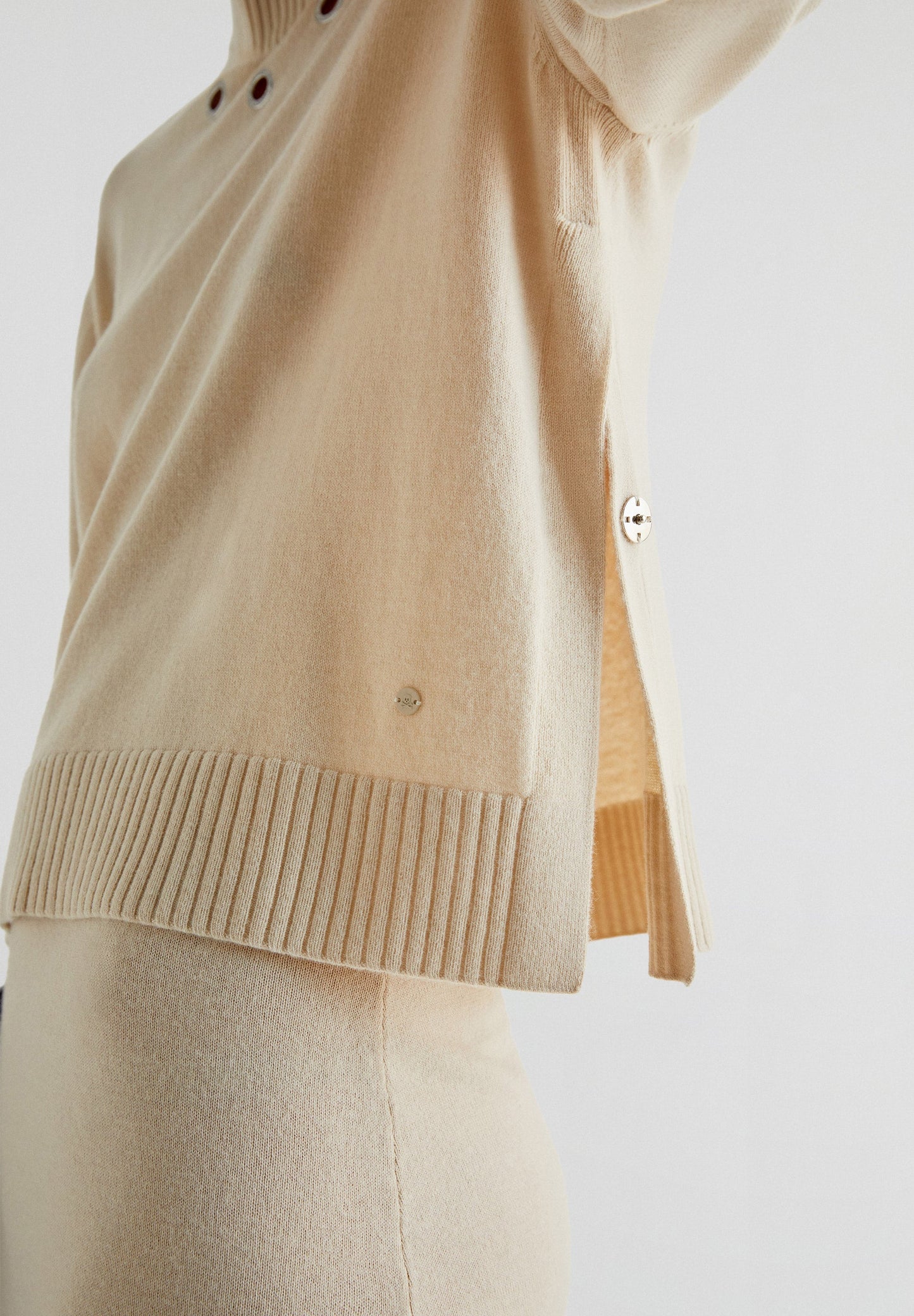 SWEATER WITH EYELET DETAILS