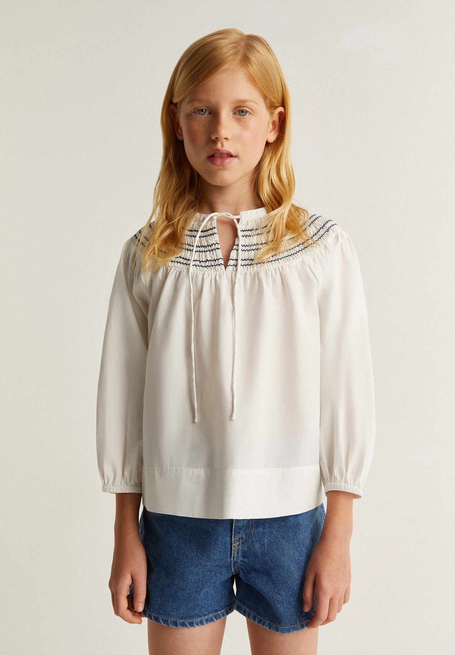 SMOCKED COLLARED BLOUSE