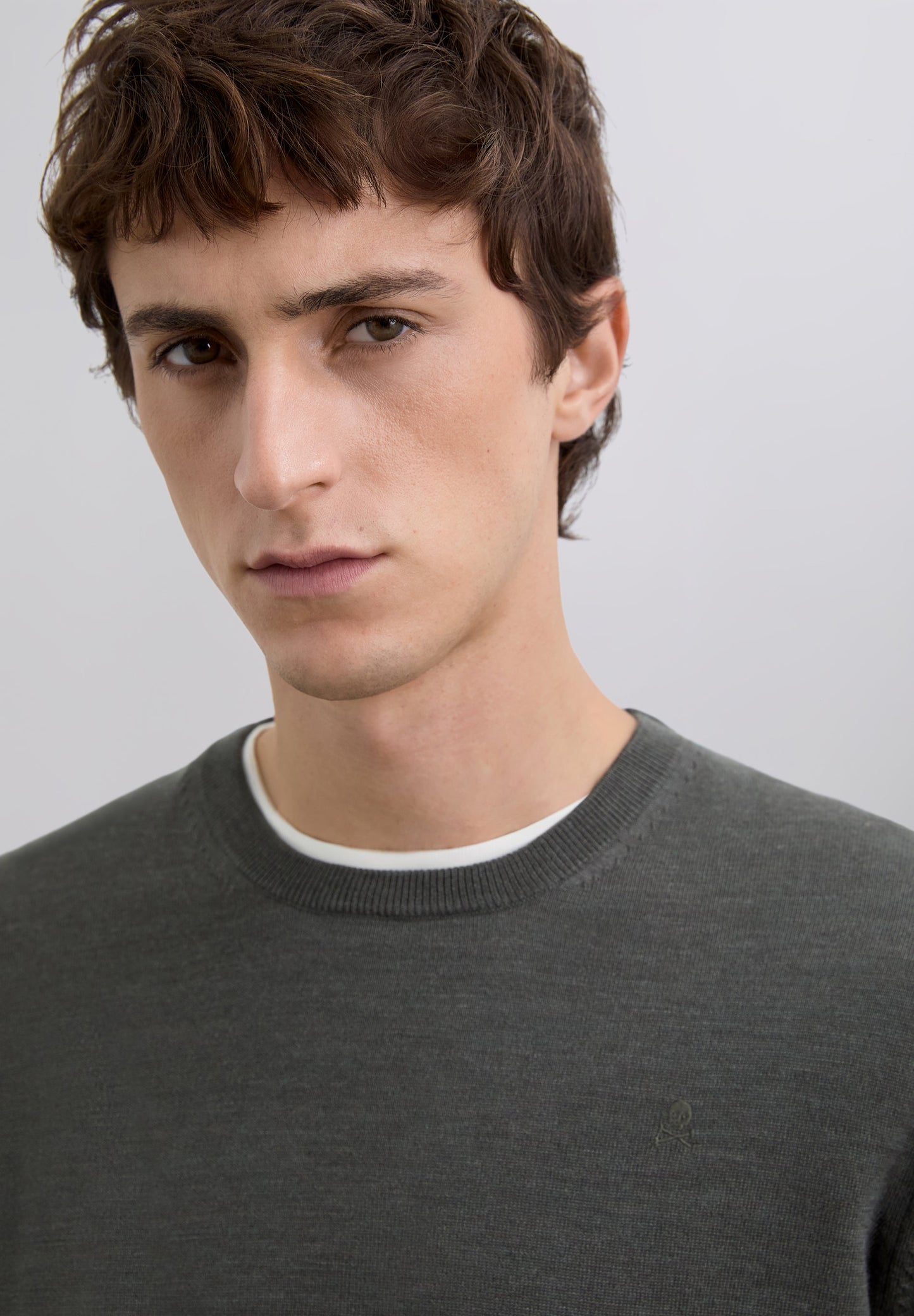 WOOL SWEATER WITH EMBROIDERED SKULL