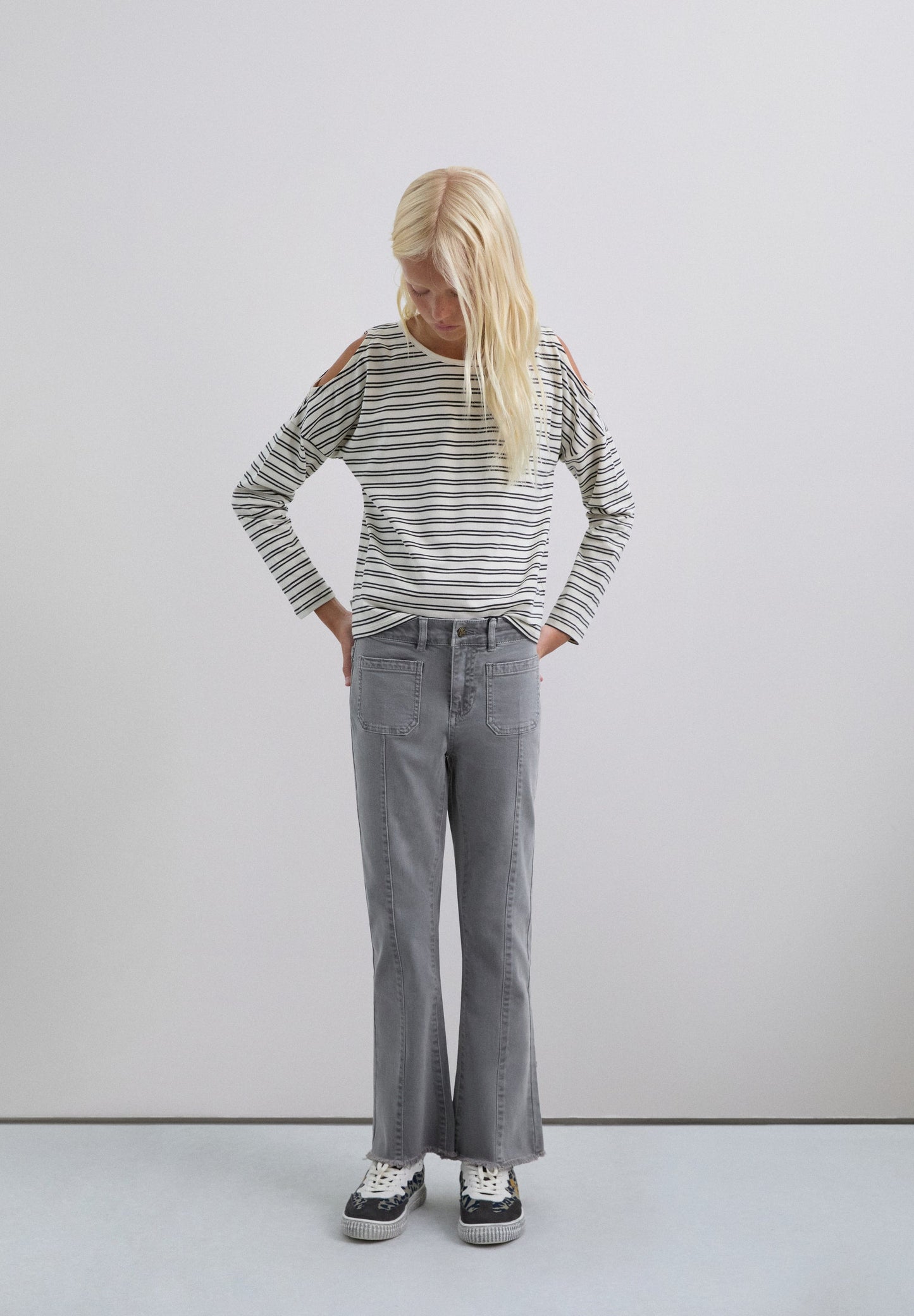FLARED TROUSERS WITH FRINGING