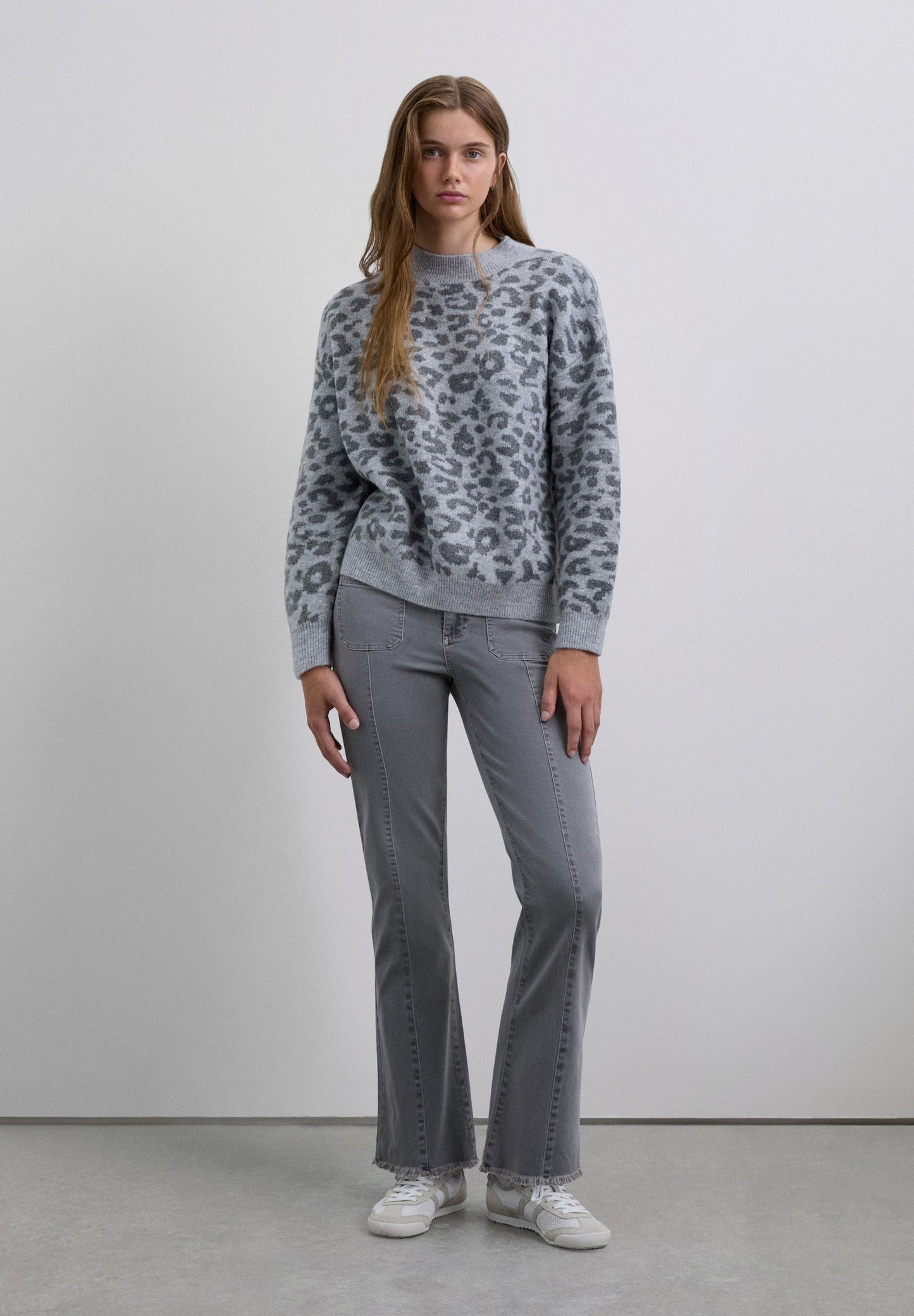 FLARED TROUSERS WITH FRINGING