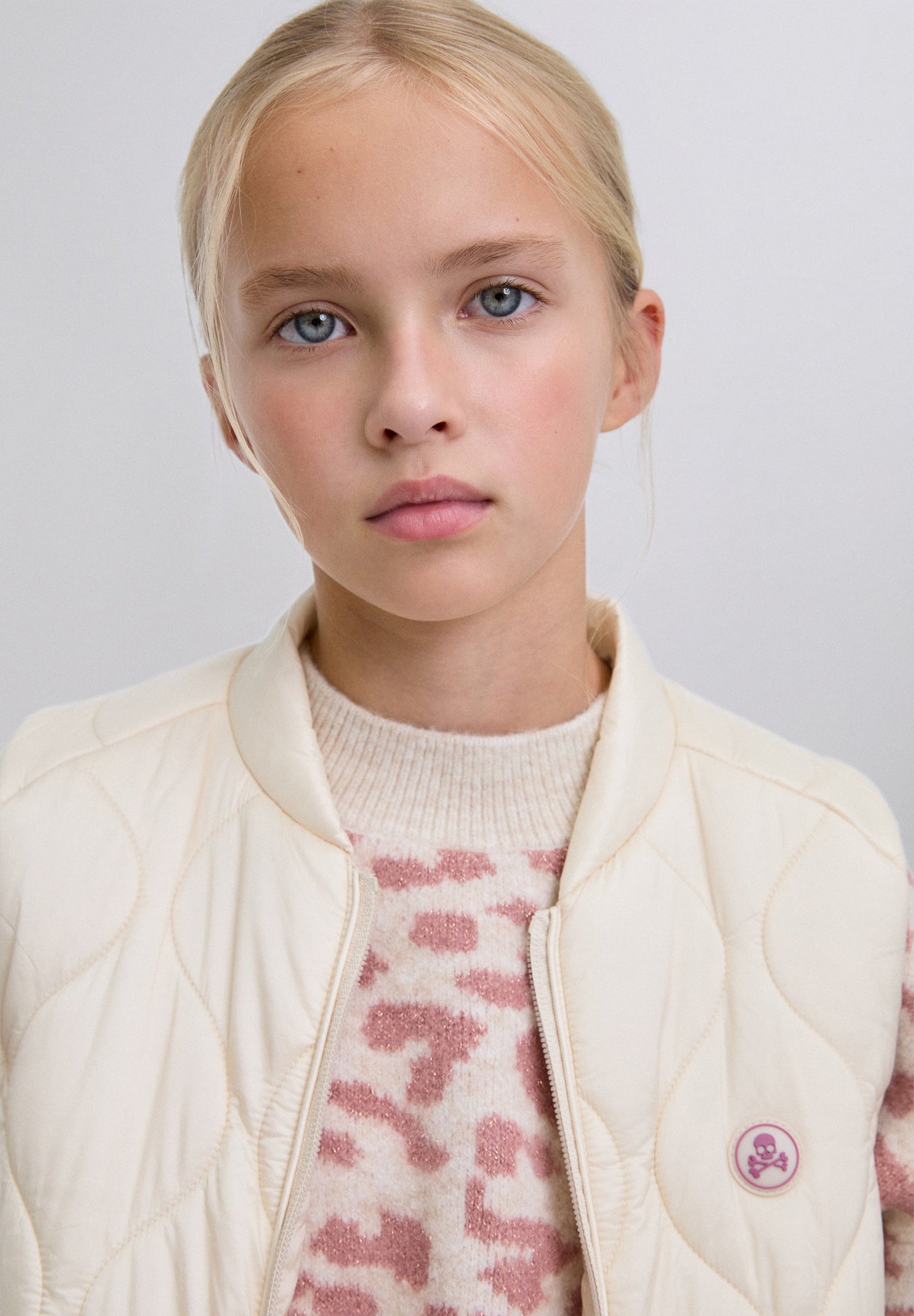 PUFFER VEST WITH SKULL