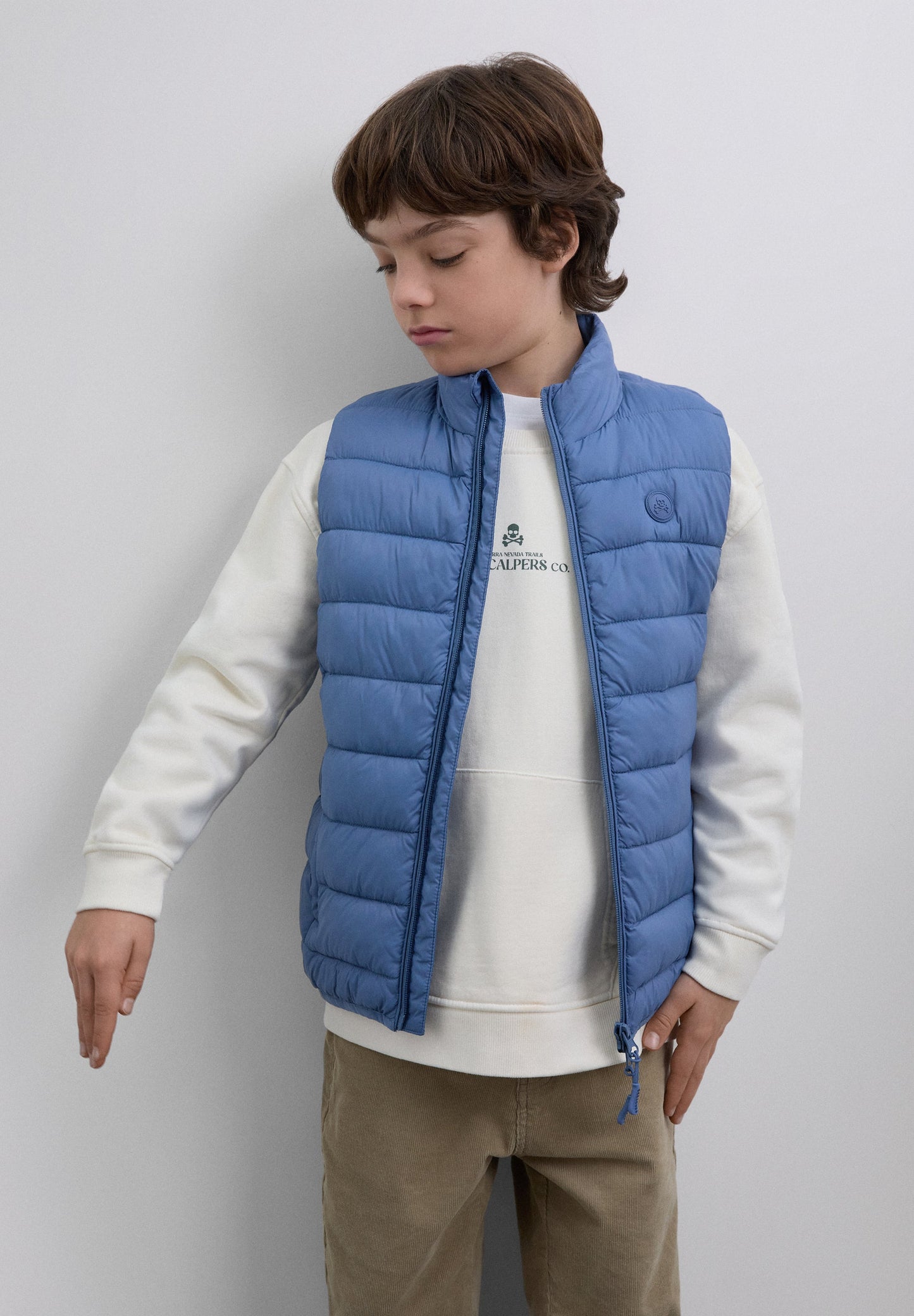 PUFFER VEST WITH SKULL