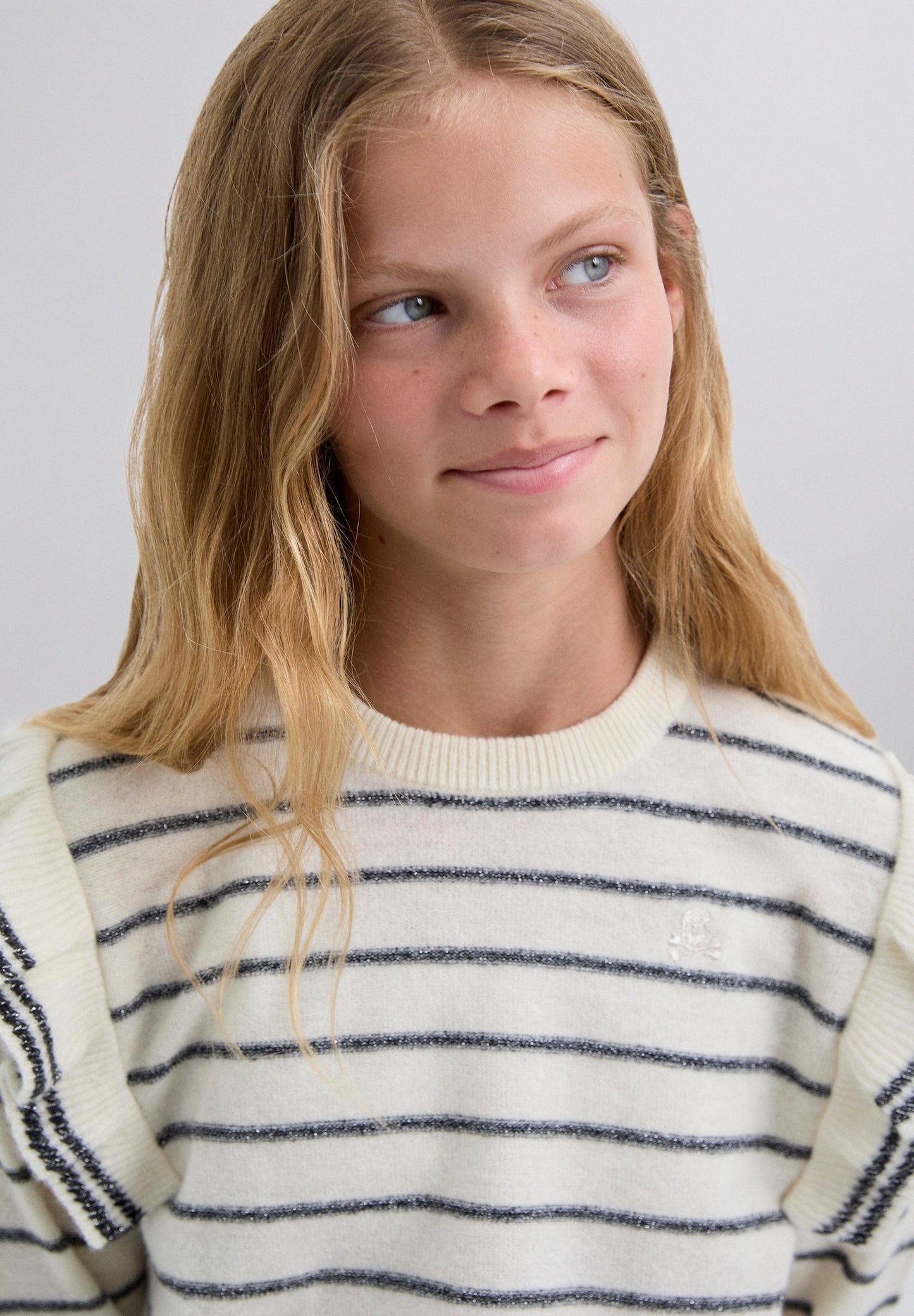 STRIPED SWEATER WITH RUFFLE