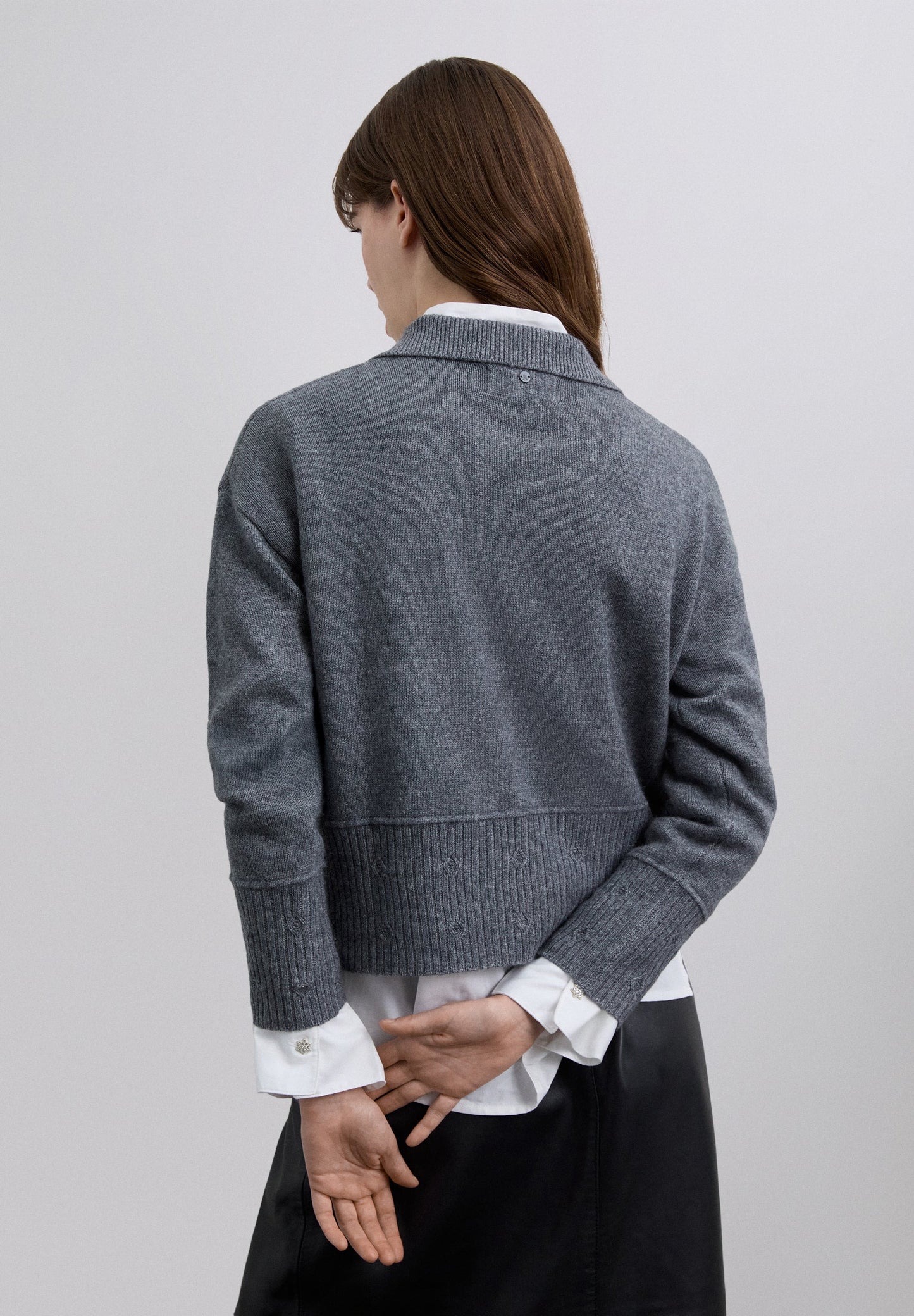 POLO JUMPER WITH EMBOSSED DETAILS
