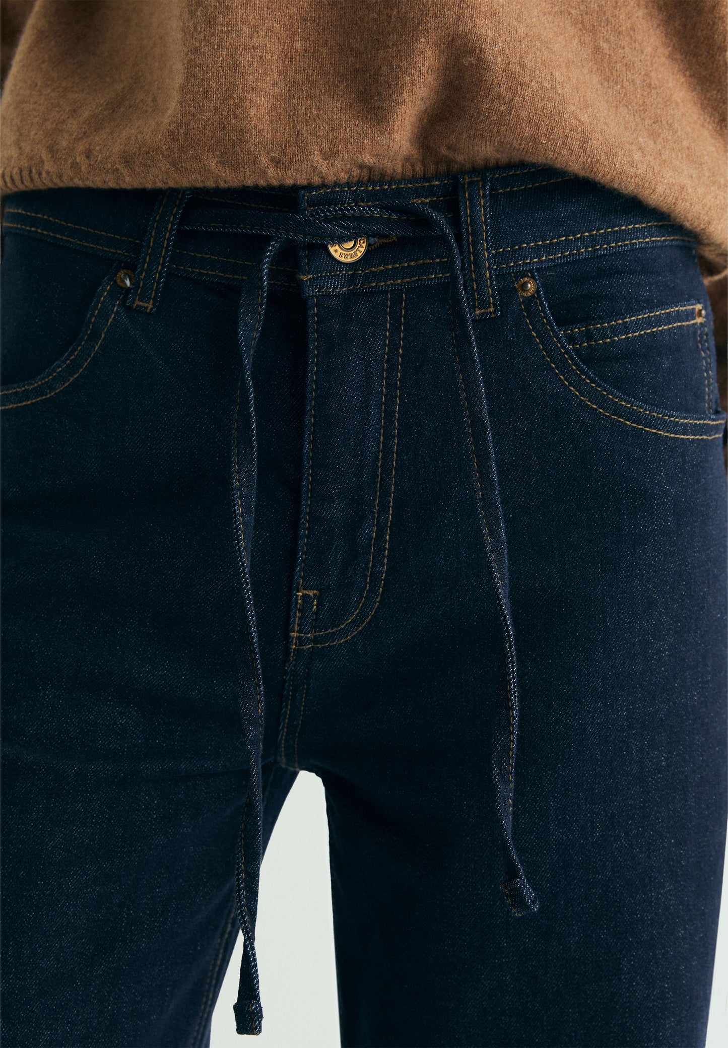 JEANS WITH WAISTBAND DETAIL