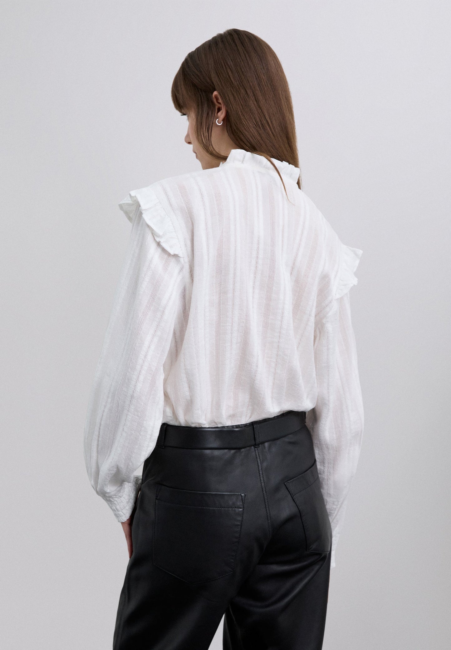 RUCHED BLOUSE WITH RUFFLES.