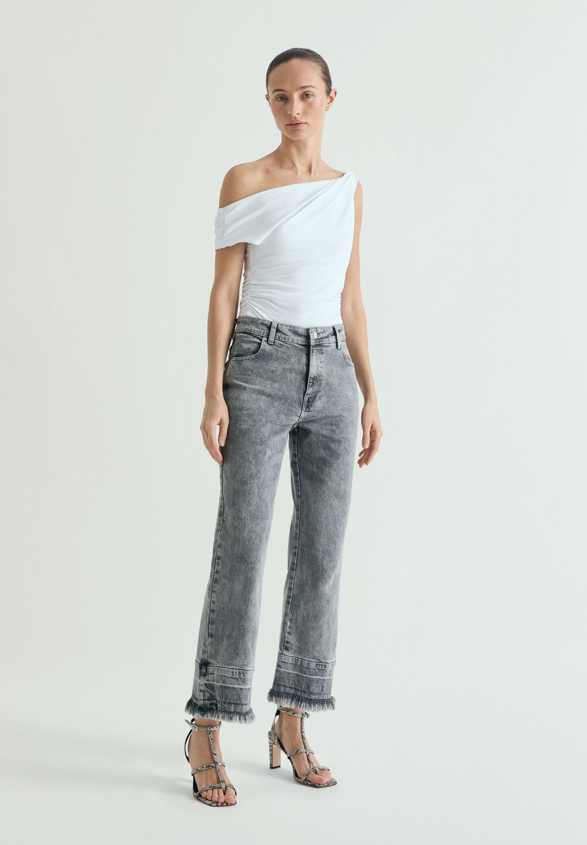 FADED FRAYED EDGE JEANS