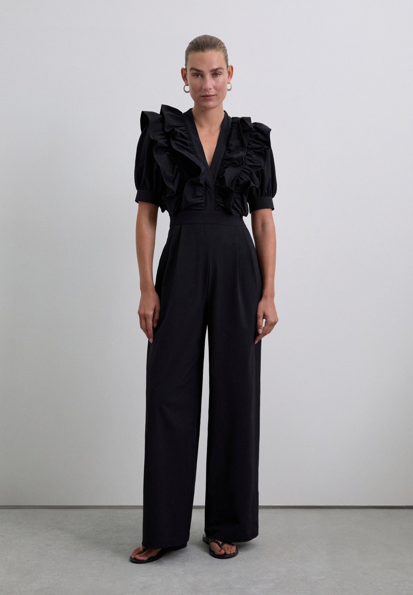 BLACK JUMPSUIT WITH RUFFLES