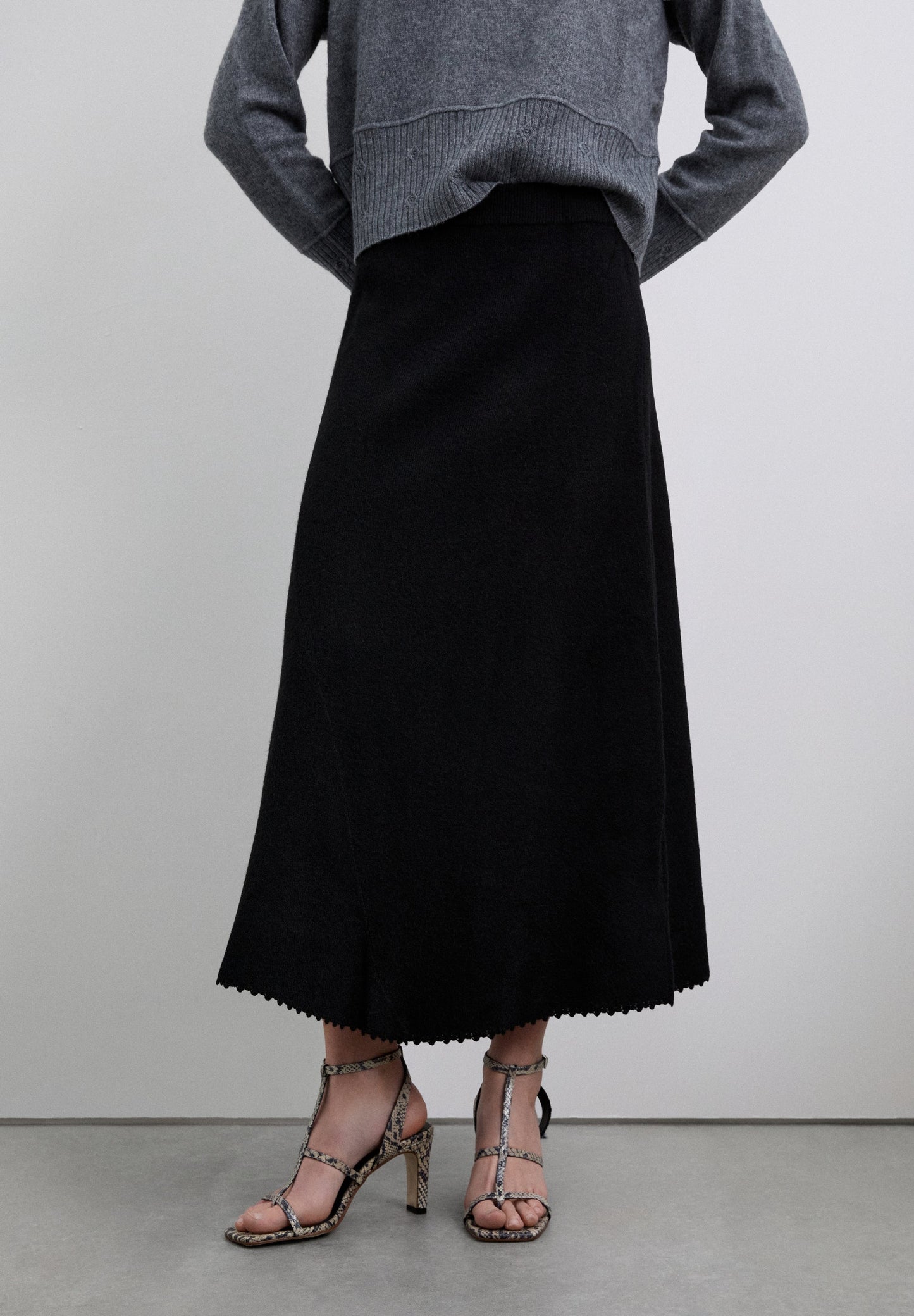 SPECIAL FINISH ASYMMETRIC SKIRT