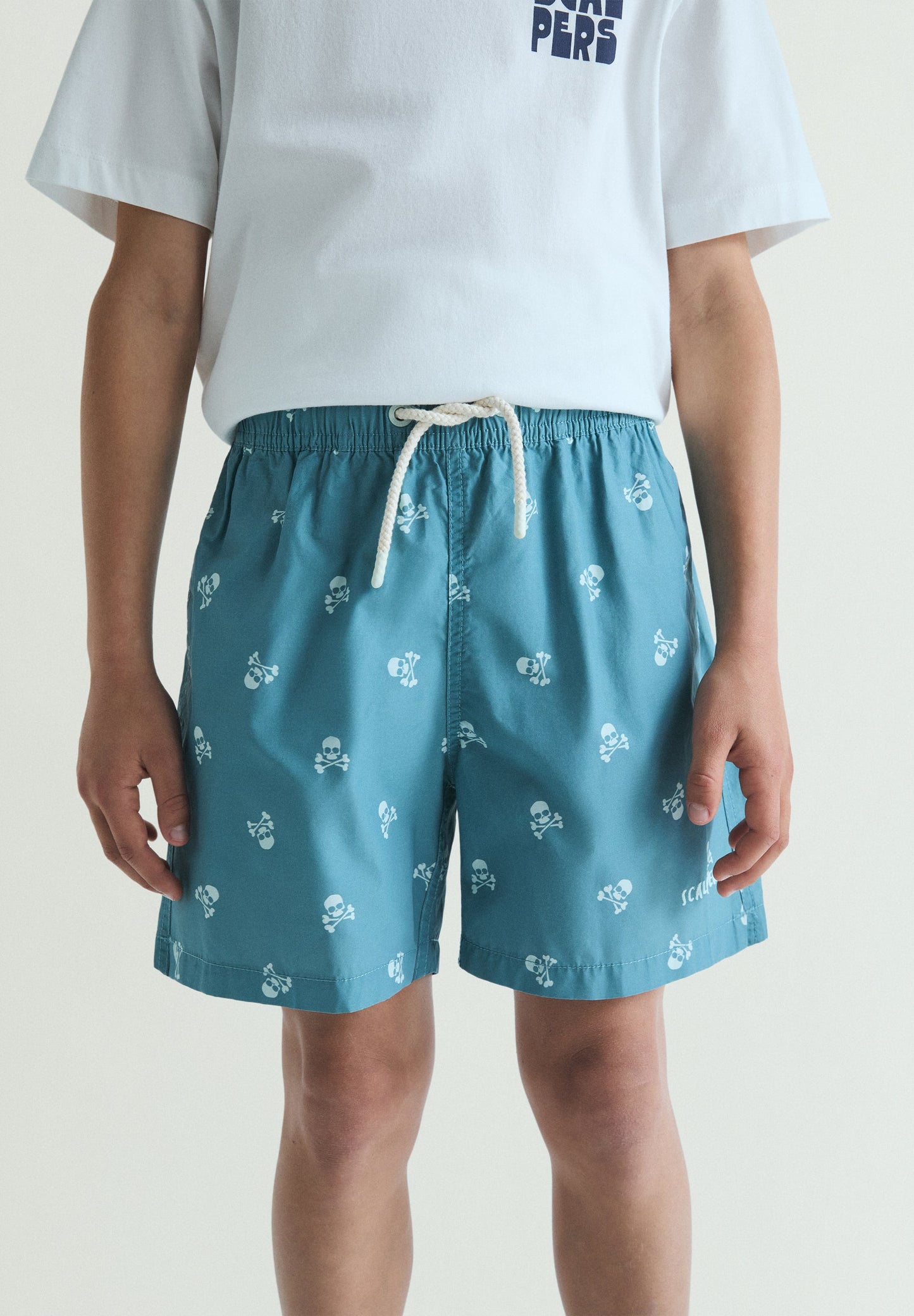 CONTRAST SKULL SWIMMING TRUNKS
