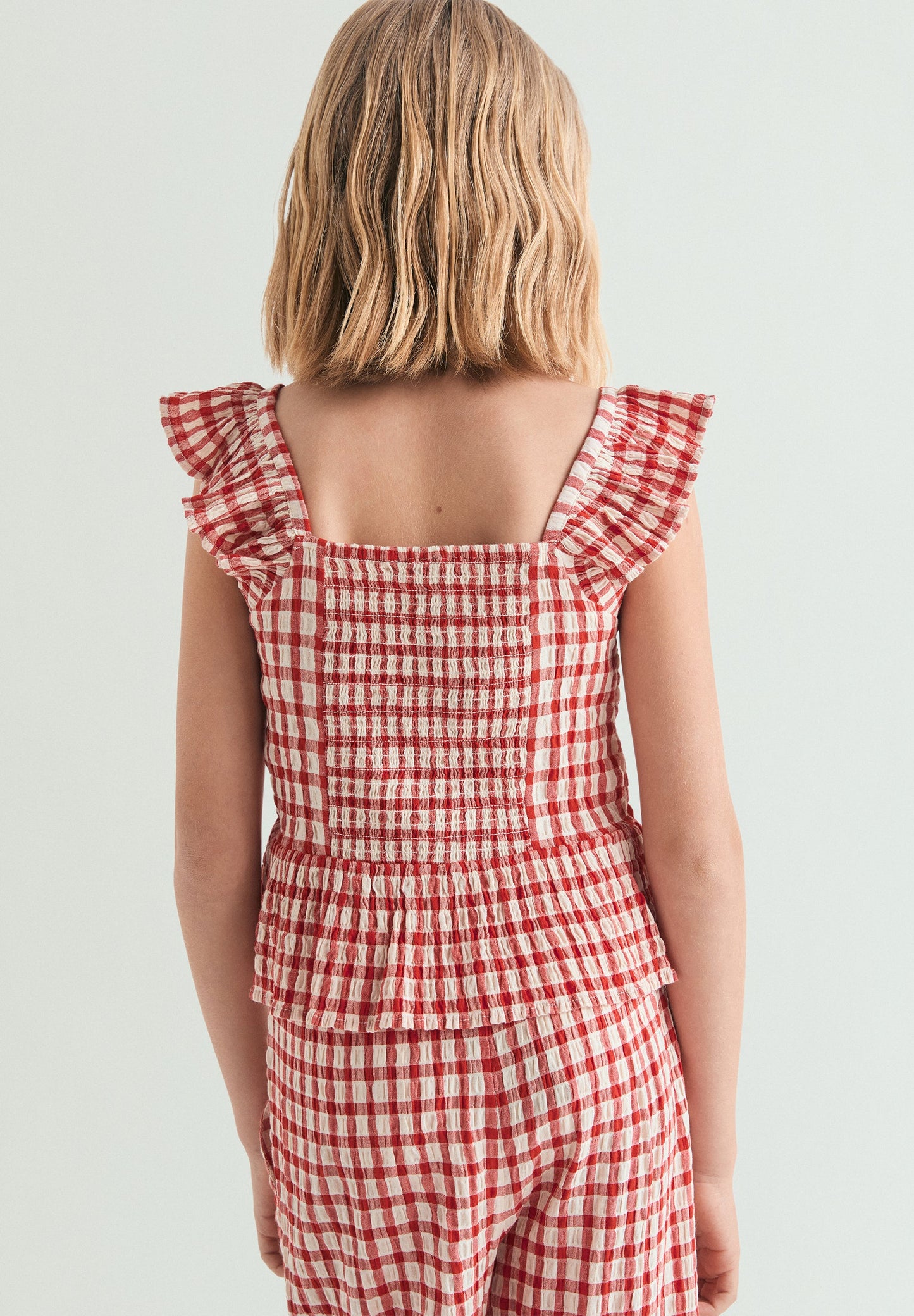 SMOCKED GINGHAM TOP