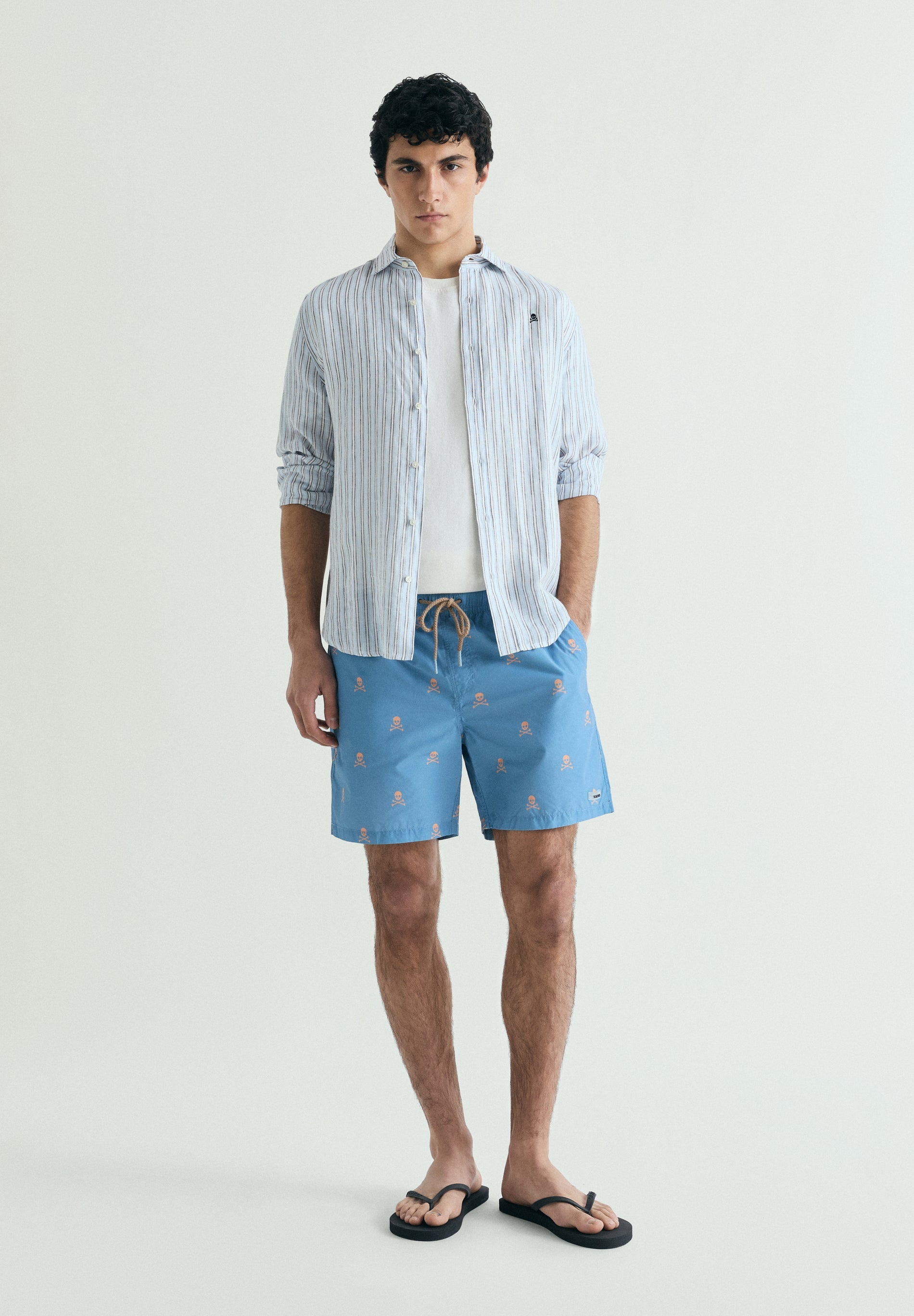 CONTRAST SKULL SWIMMING TRUNKS