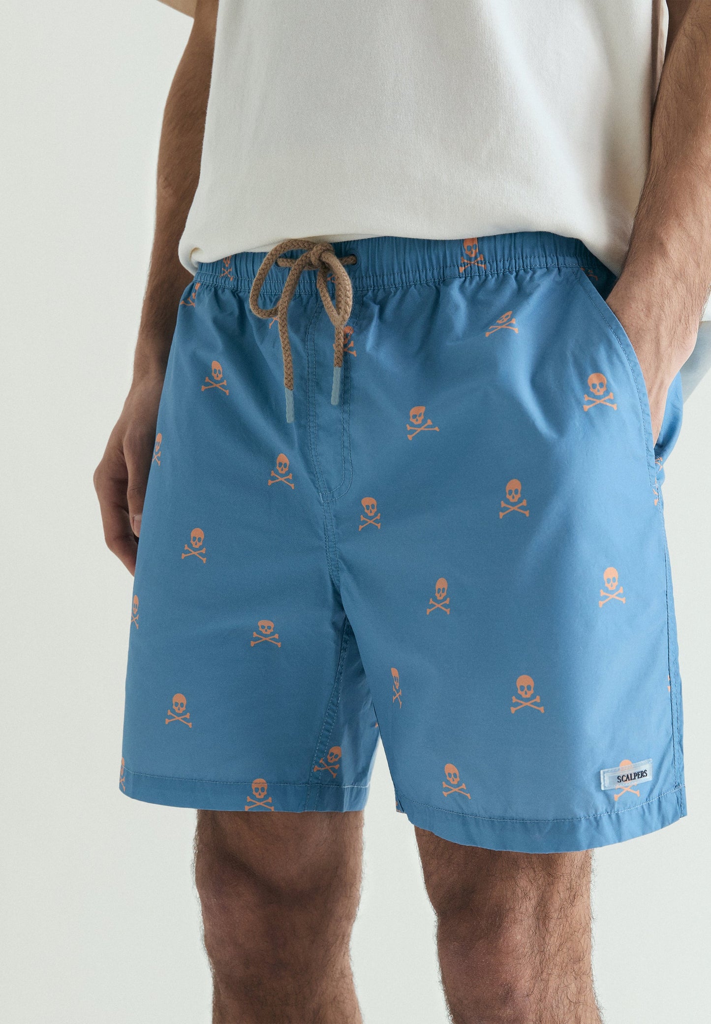 CONTRAST SKULL SWIMMING TRUNKS