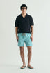CONTRAST SKULL SWIMMING TRUNKS