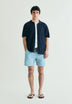 CONTRAST SKULL SWIMMING TRUNKS