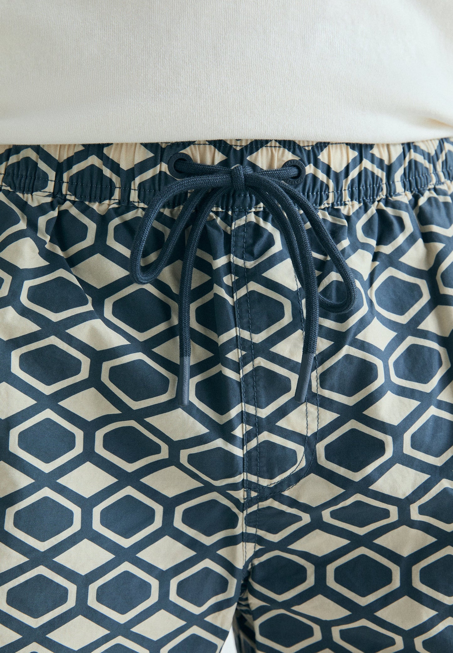 GEOMETRIC PRINT SWIMMING TRUNKS