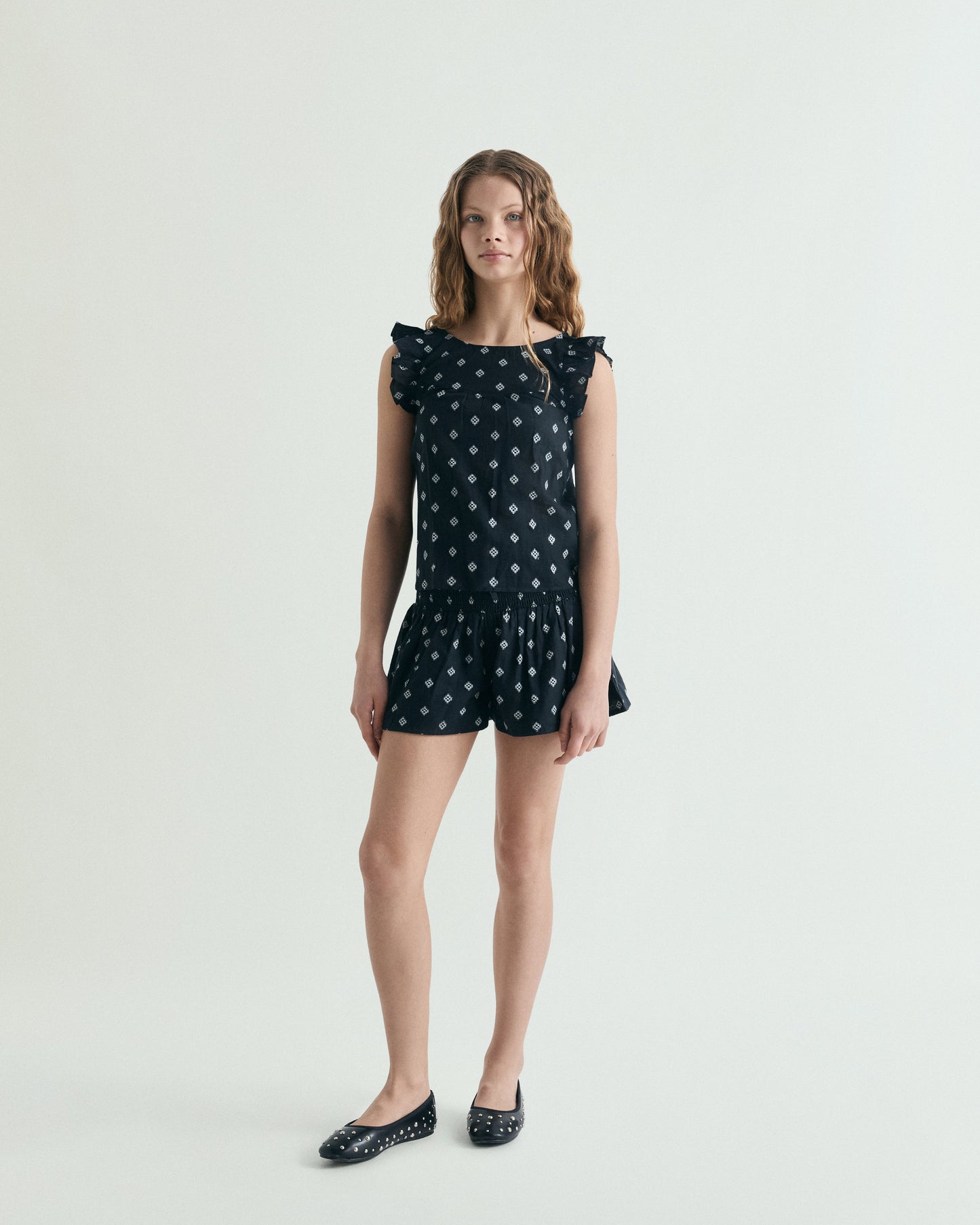 SLEEVELESS JACQUARD BLOUSE
