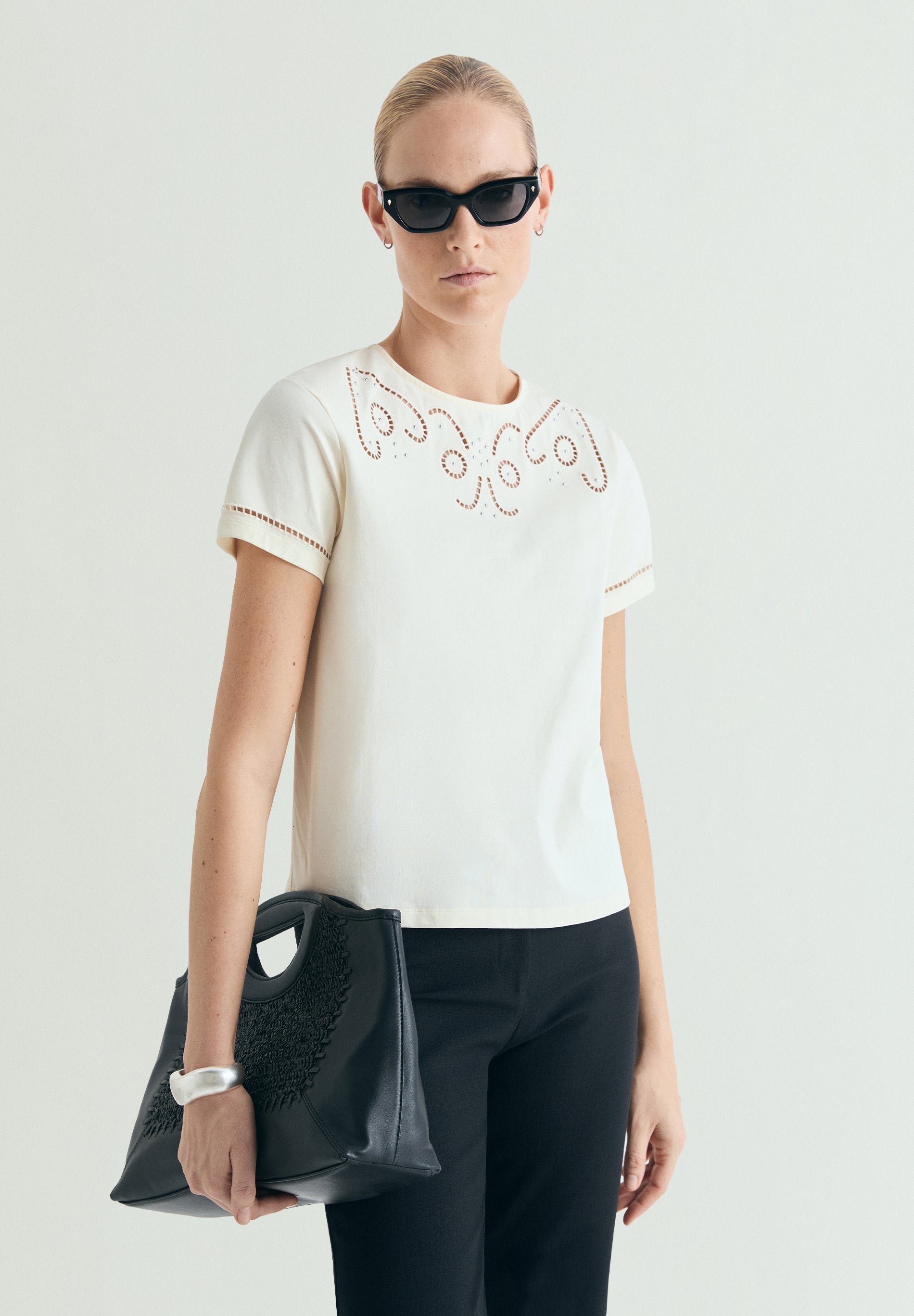 T-SHIRT WITH DIE-CUT STUDDED DETAILS
