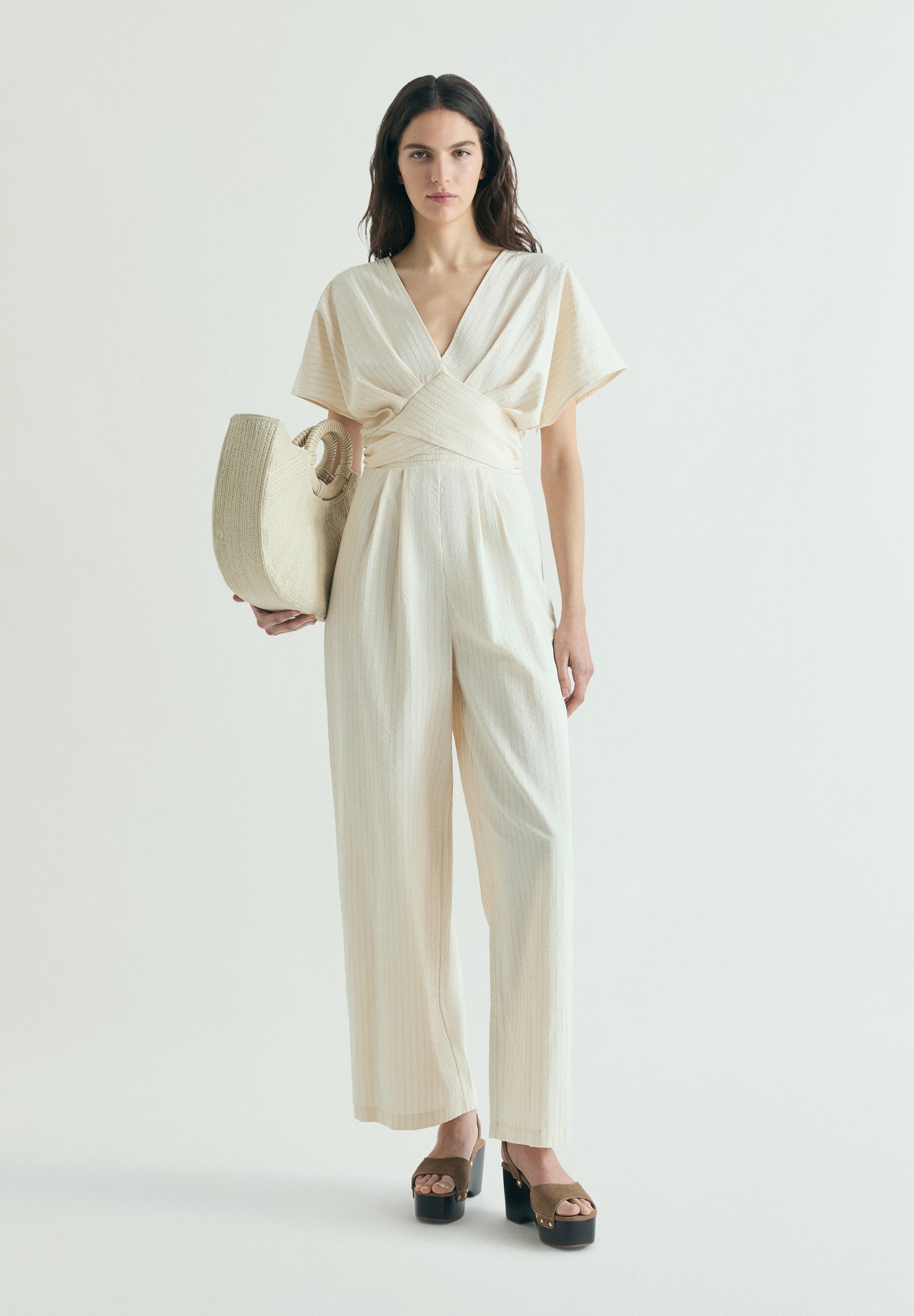 STRIPED JUMPSUIT WITH CROSSOVER WAIST