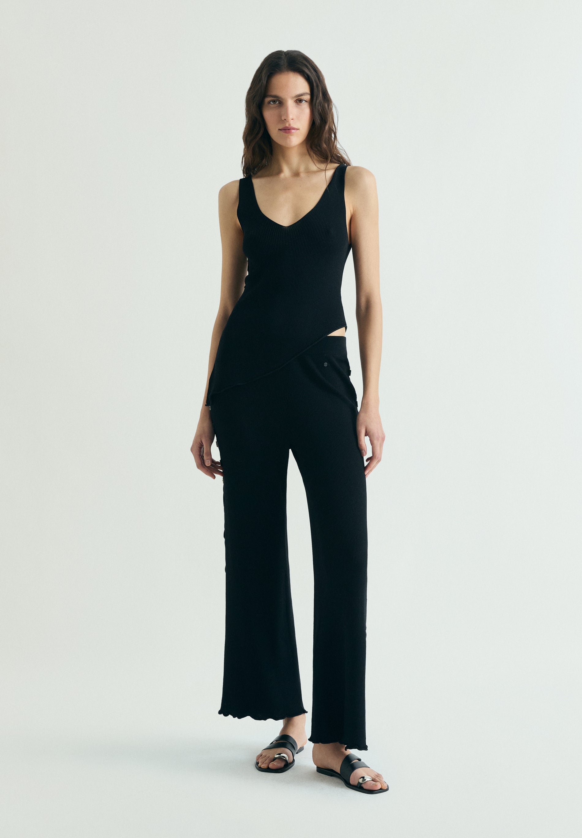 KNIT TROUSERS WITH SIDE APPLIQUÉS