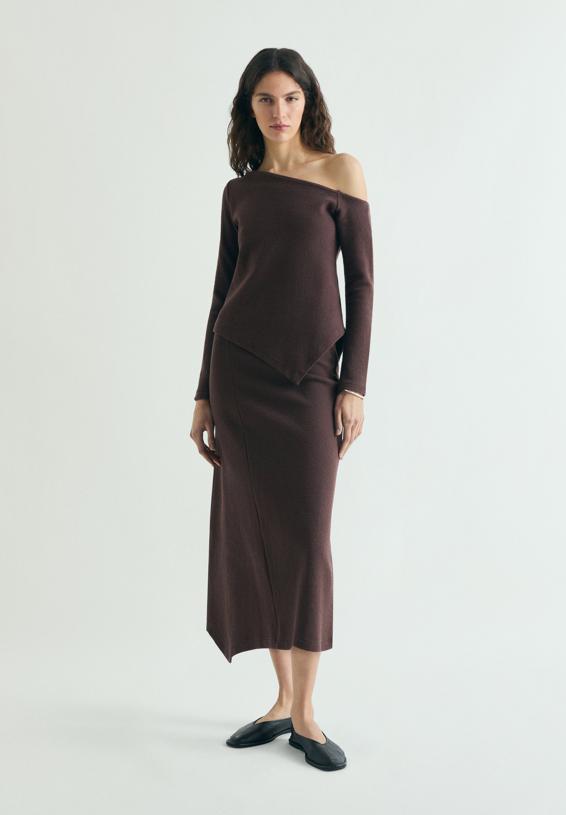 ASYMMETRIC KNIT MIDI SKIRT