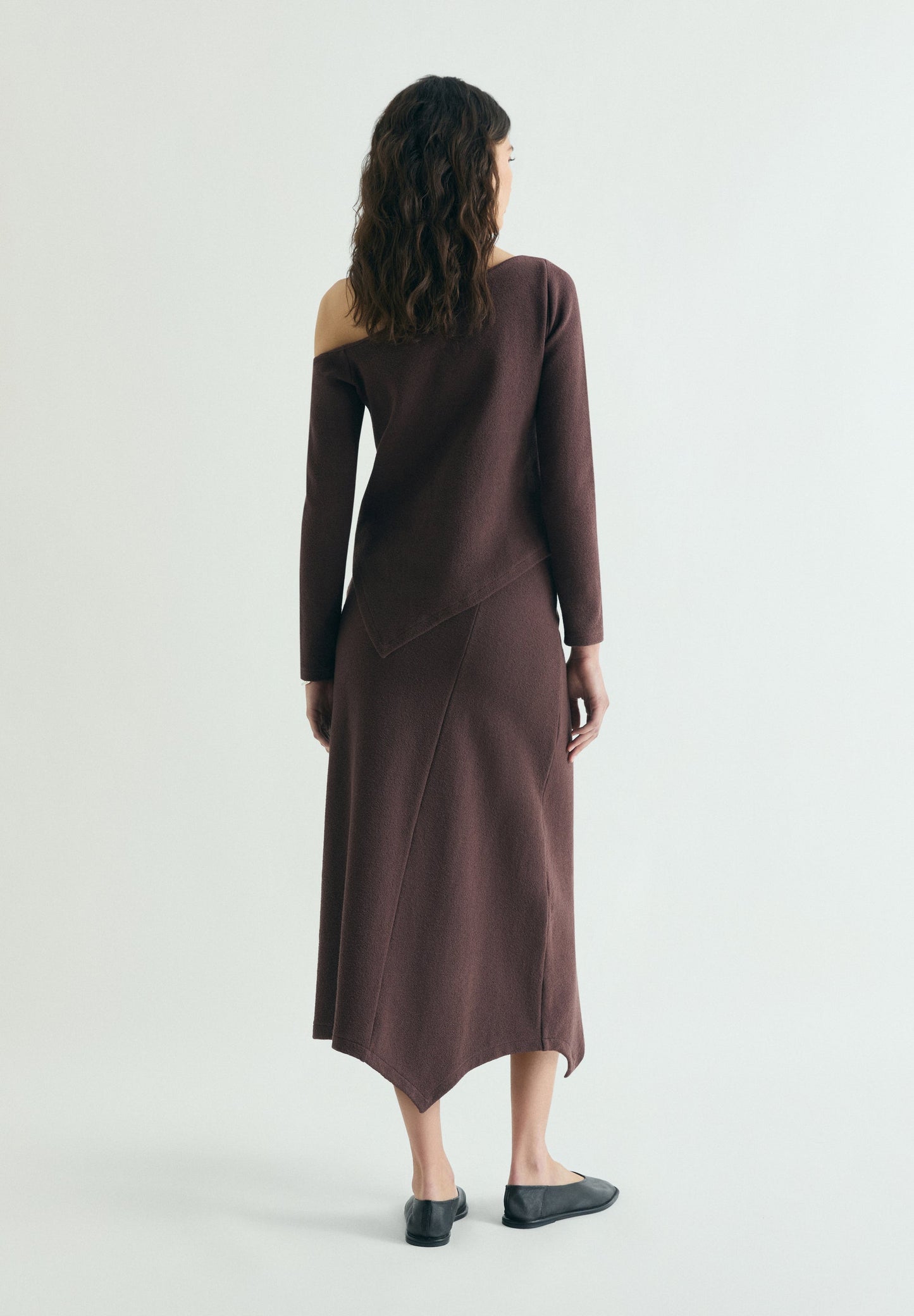 ASYMMETRIC KNIT MIDI SKIRT