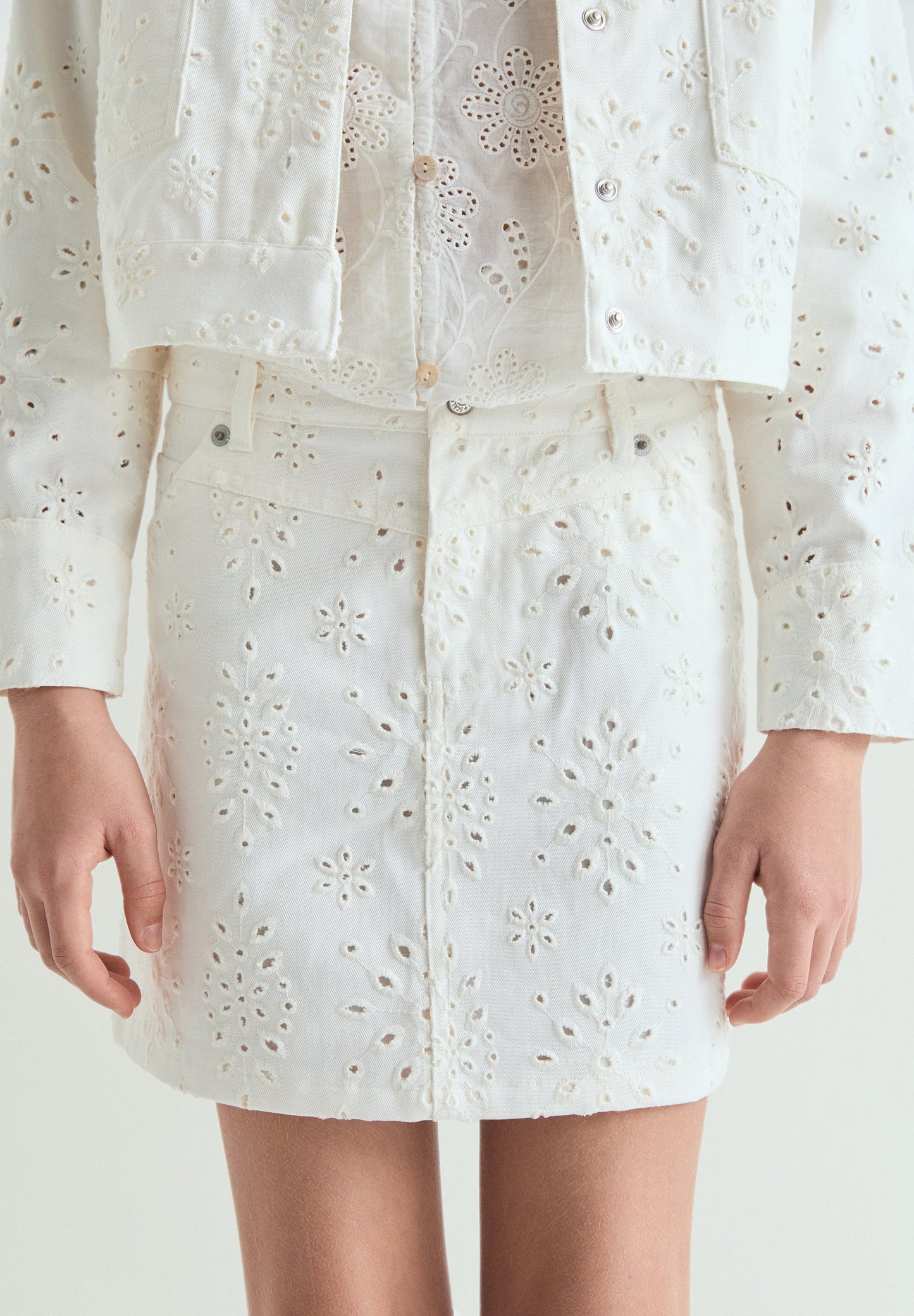 PERFORATED MINI SKIRT