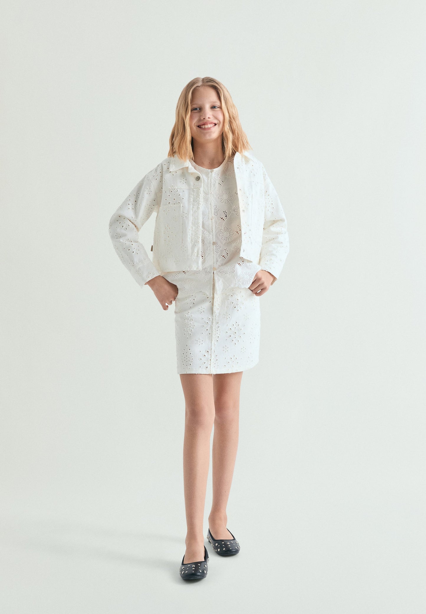 PERFORATED MINI SKIRT