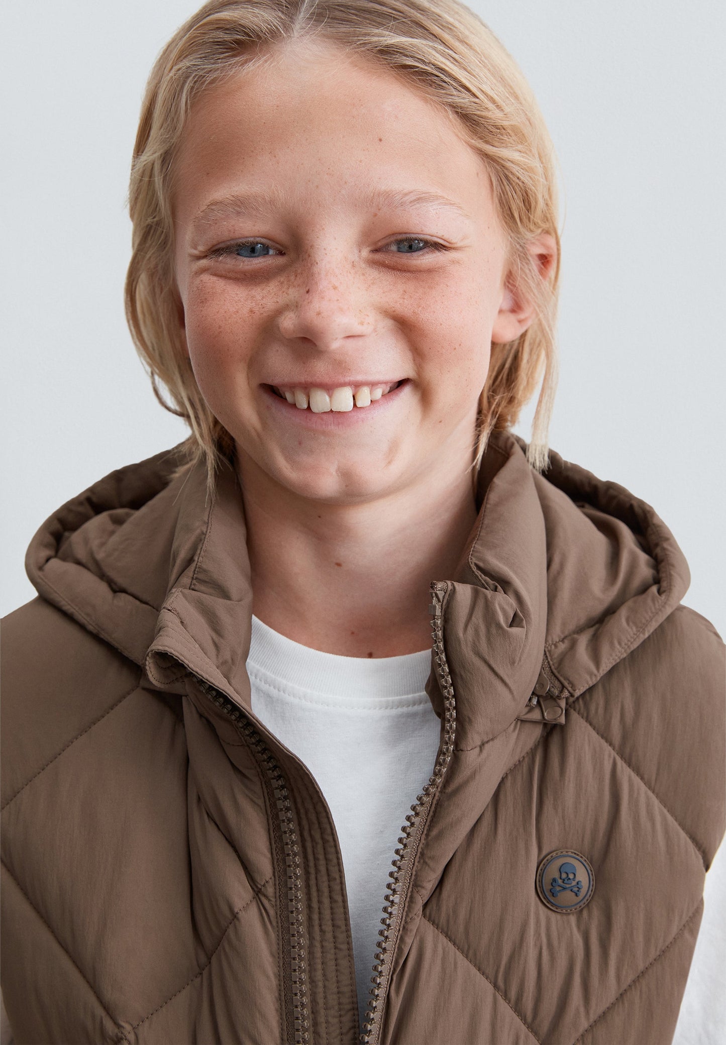PADDED VEST WITH DETACHABLE HOOD