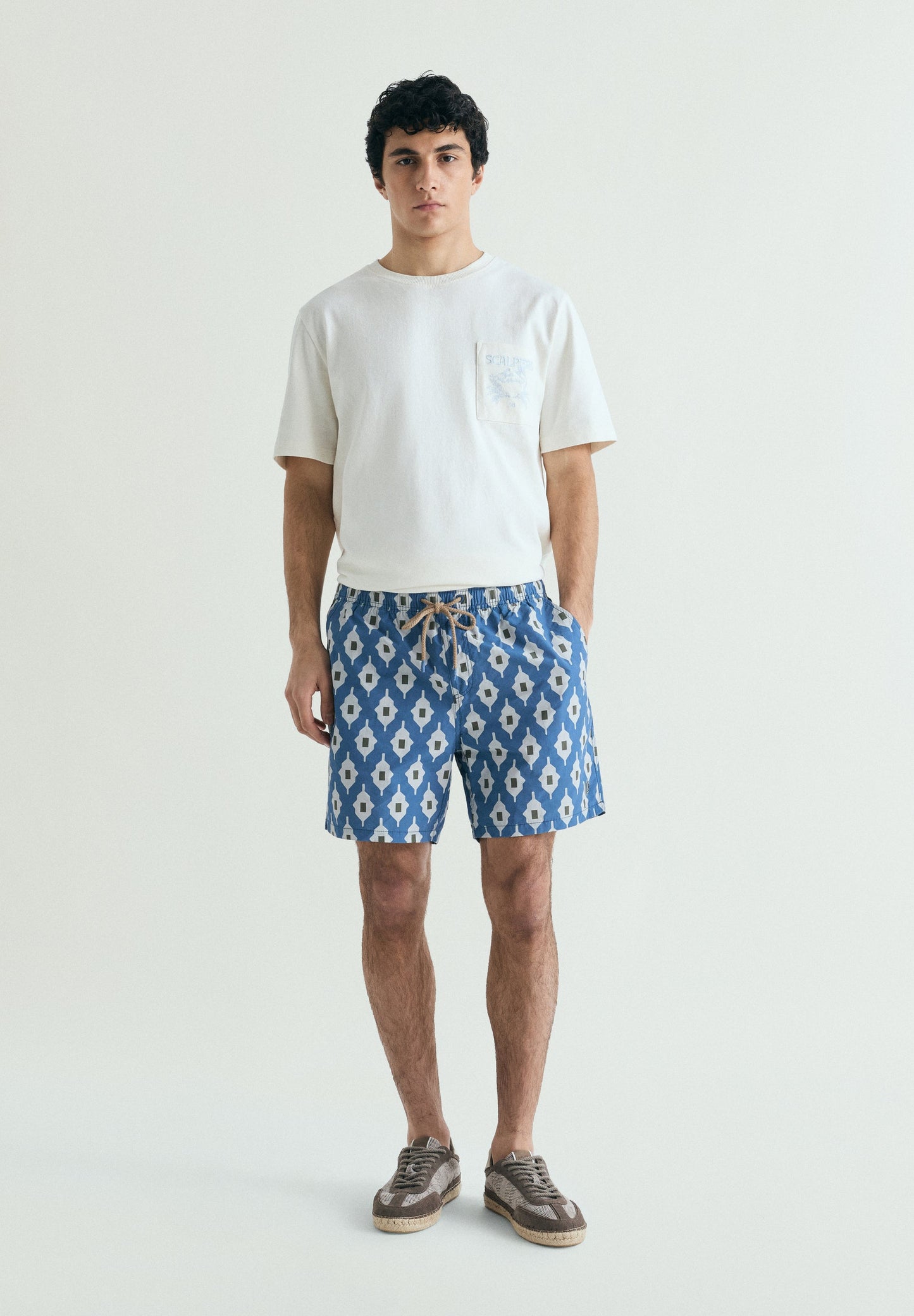 GEOMETRIC PRINT SWIMMING TRUNKS