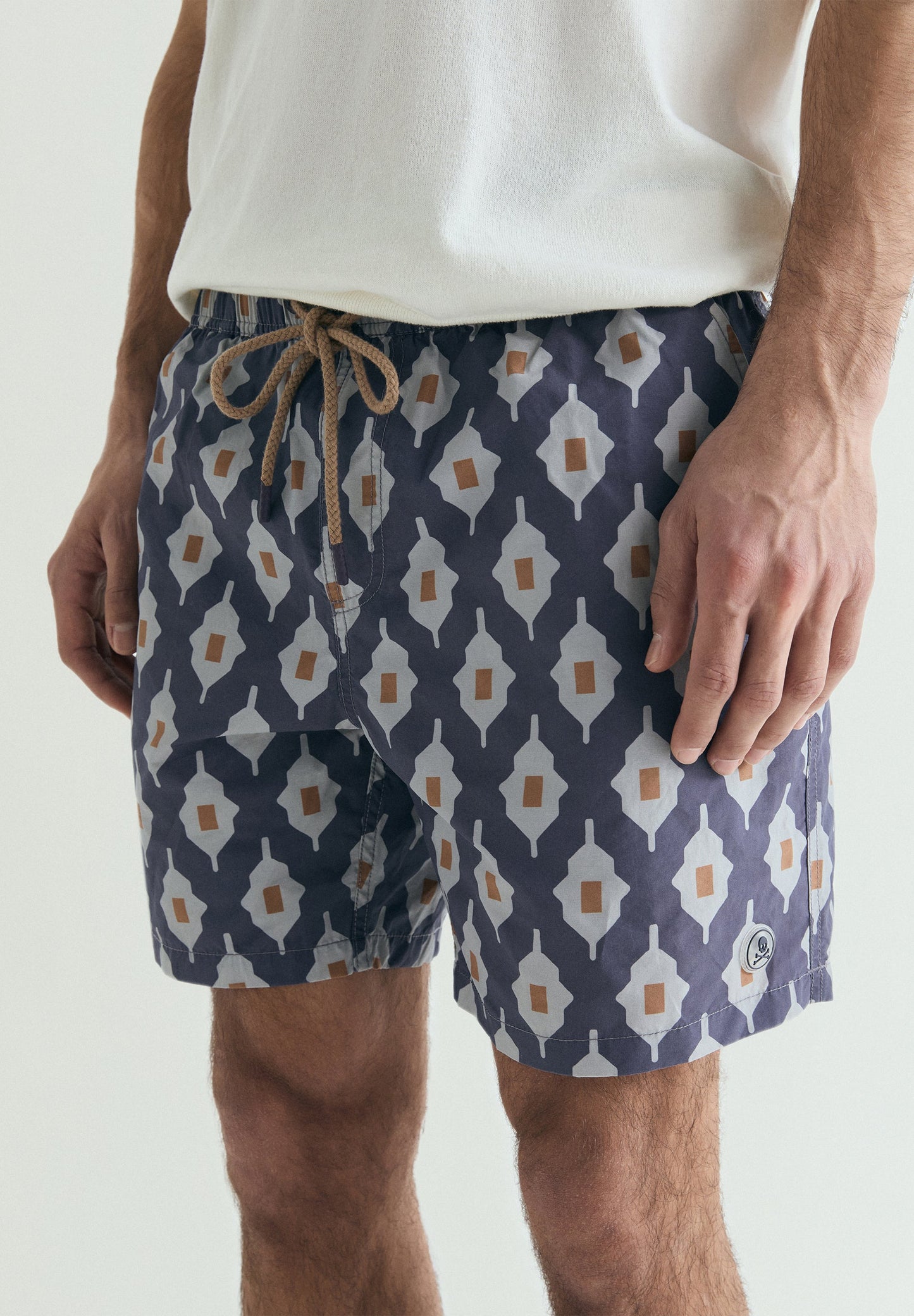 GEOMETRIC PRINT SWIMMING TRUNKS
