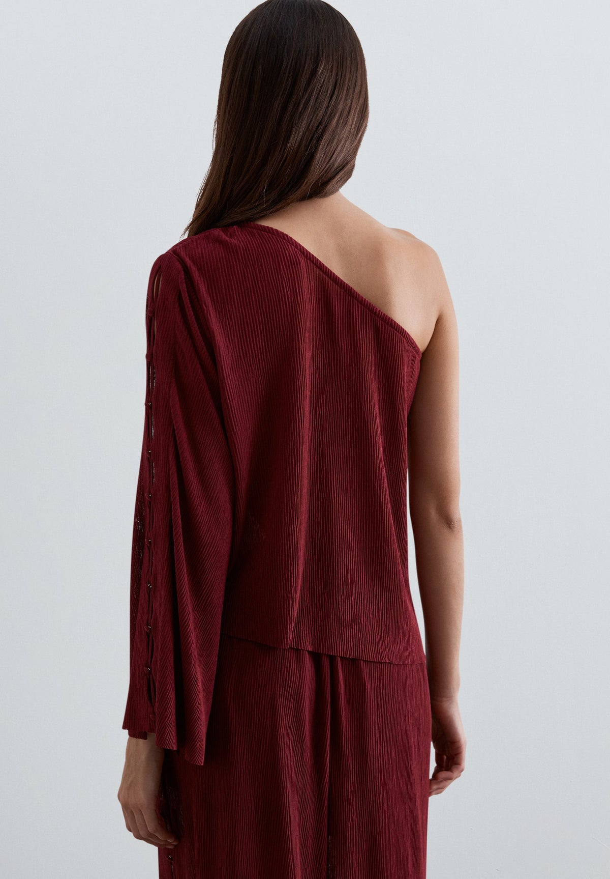 ASYMMETRIC TOP WITH CUT-OUTS