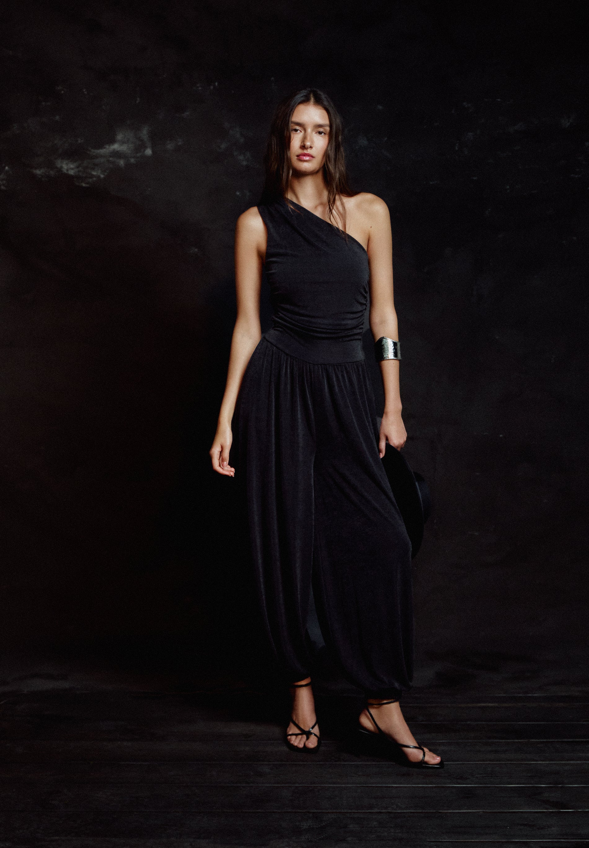 DRAPED ASYMMETRIC JUMPSUIT