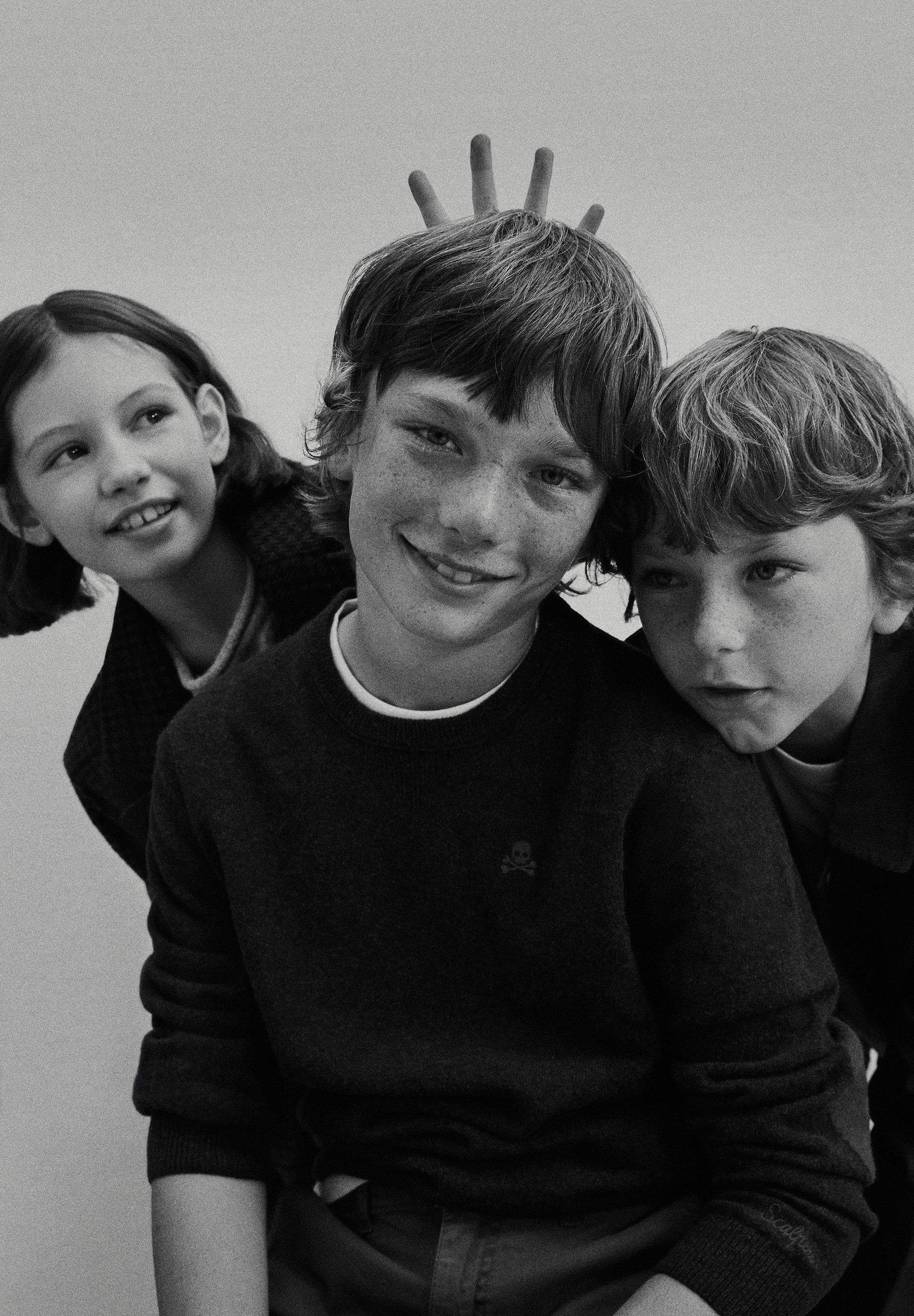 SKULL SWEATER WITH ELBOW PADS