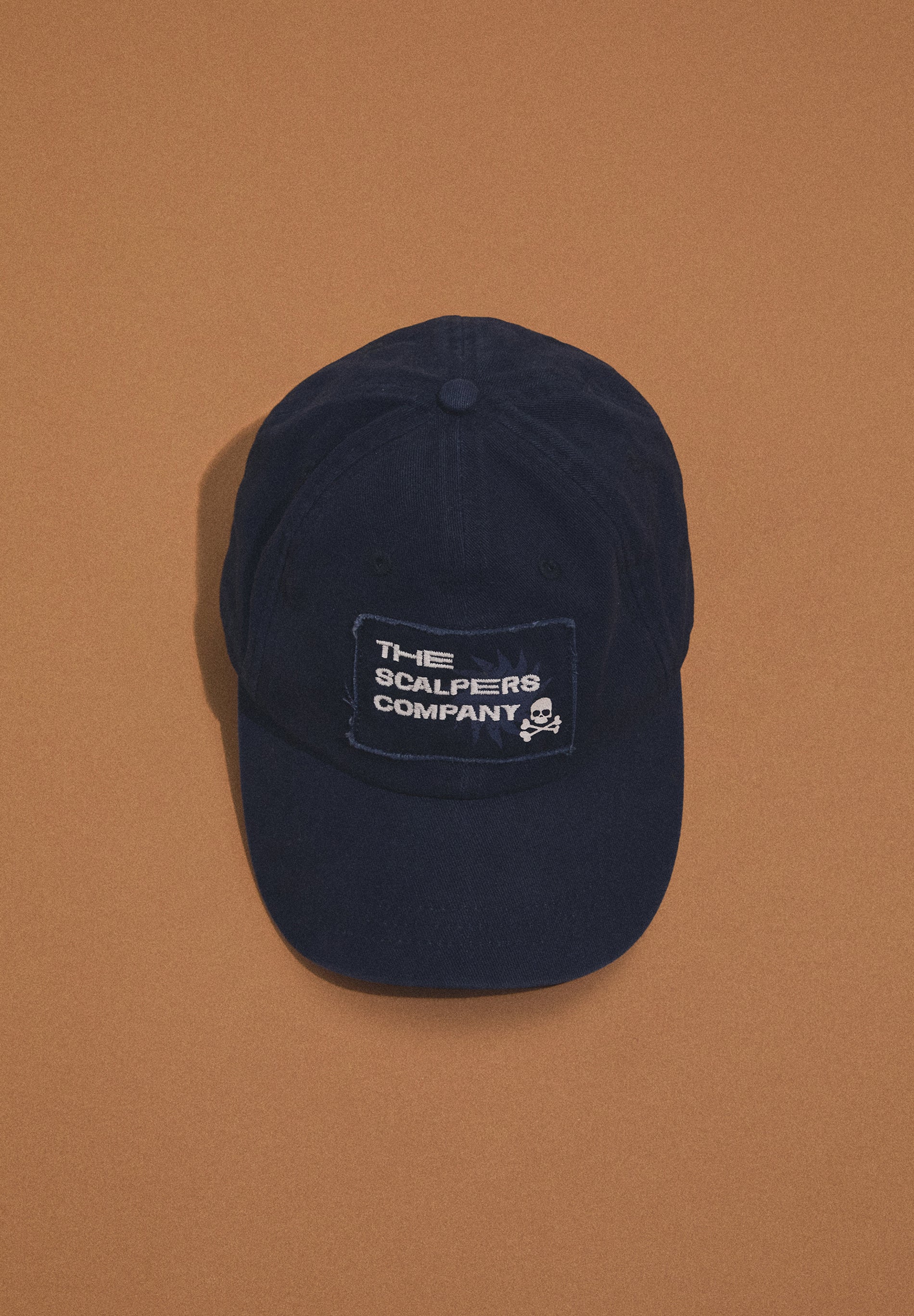 CAP WITH EMBROIDERED TEXT