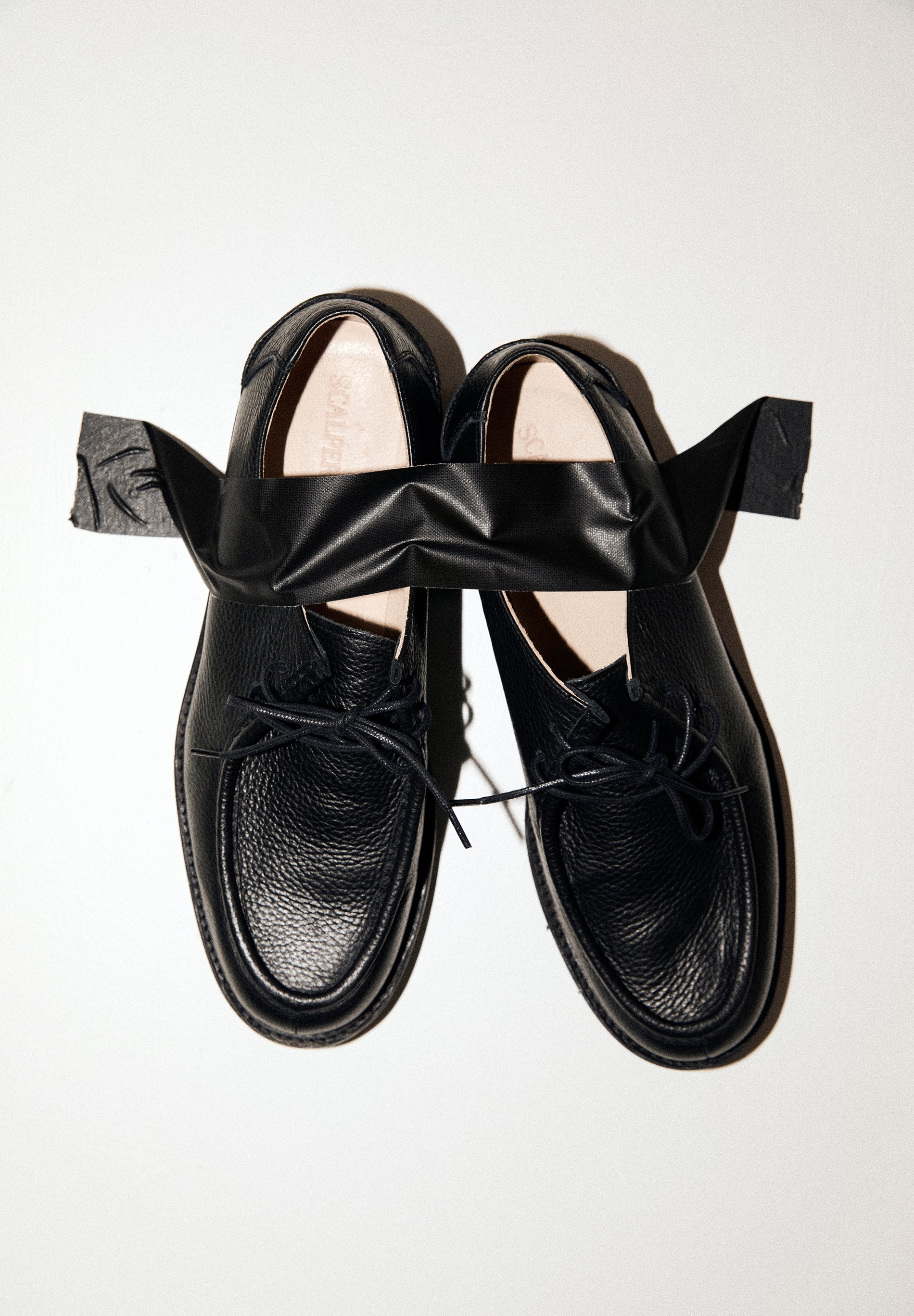 LEATHER SHOES WITH TRACK SOLES