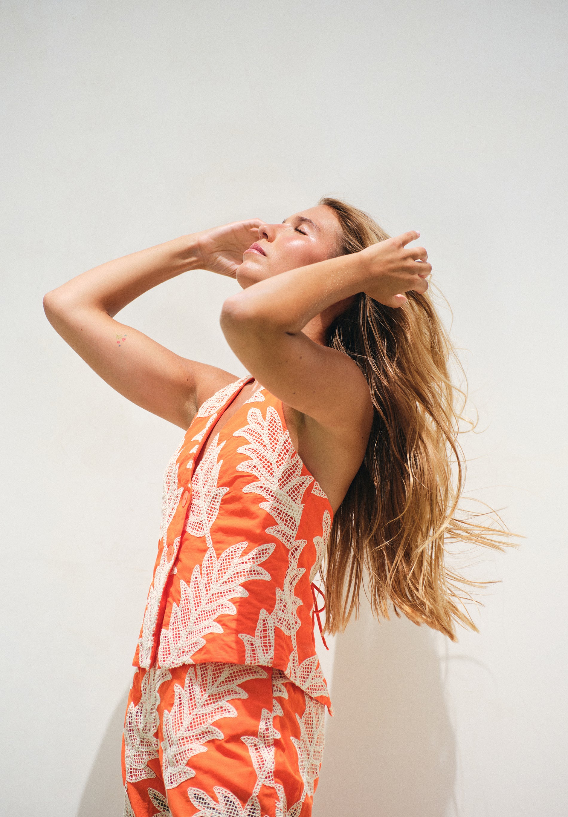 HALTER TOP WITH EMBROIDERY