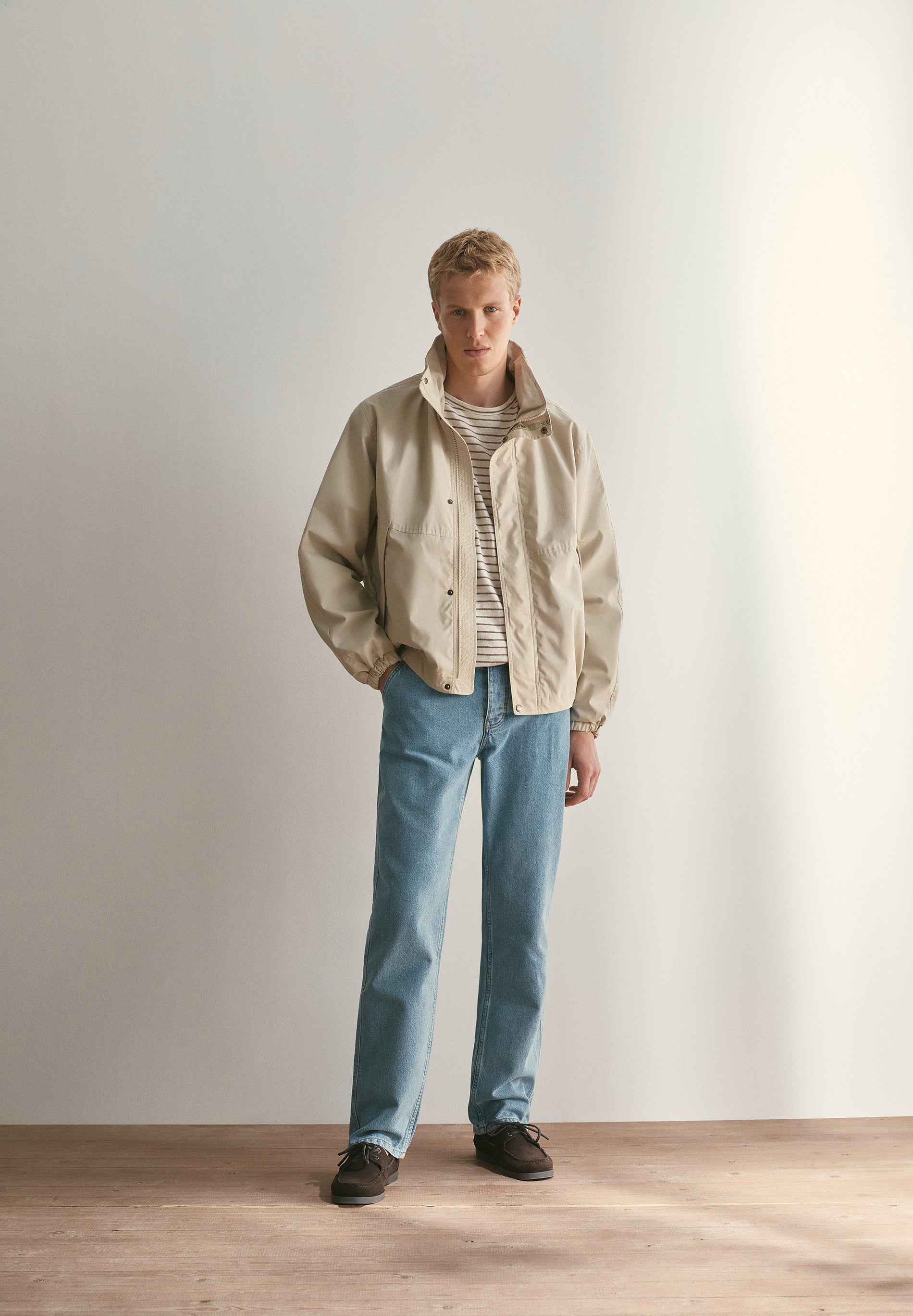 TECHNICAL JACKET WITH CONCEALED HOOD