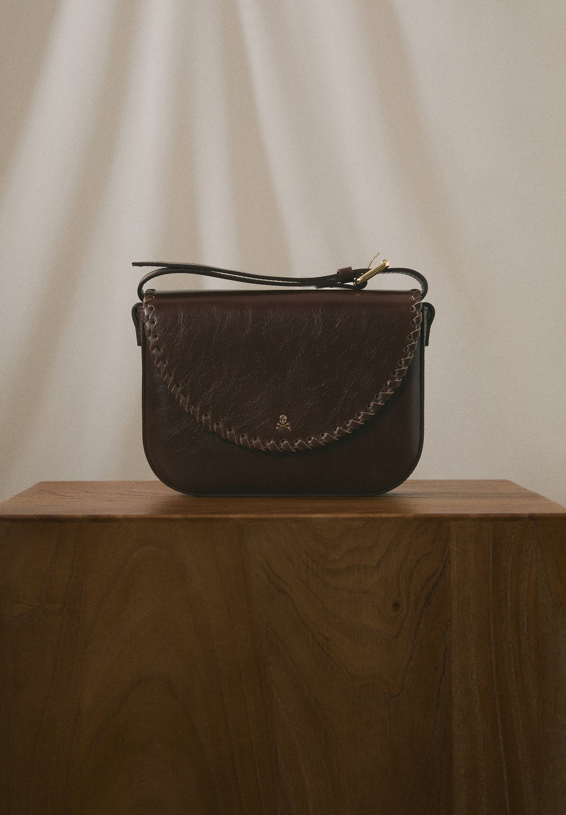 BRAIDED LEATHER CROSSBODY BAG